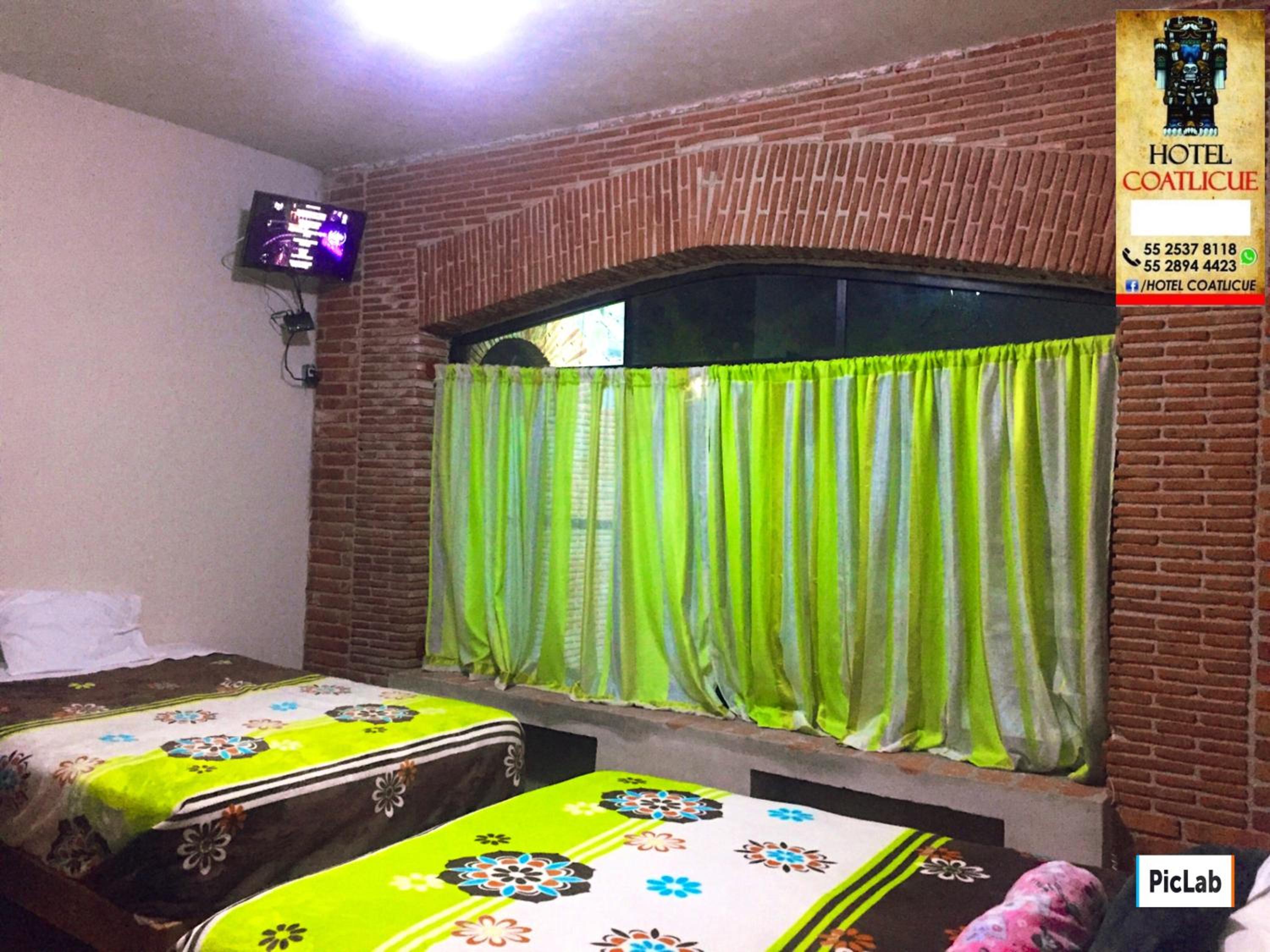 Deluxe Queen Room with Two Queen Beds - Photo 2