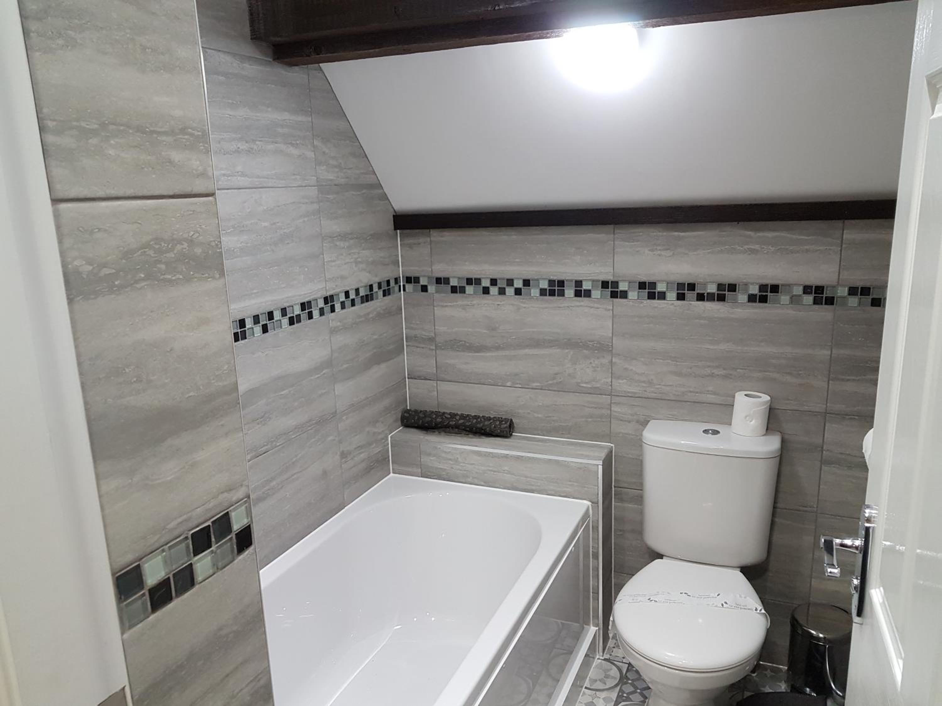 Deluxe Family Suite - Photo 11