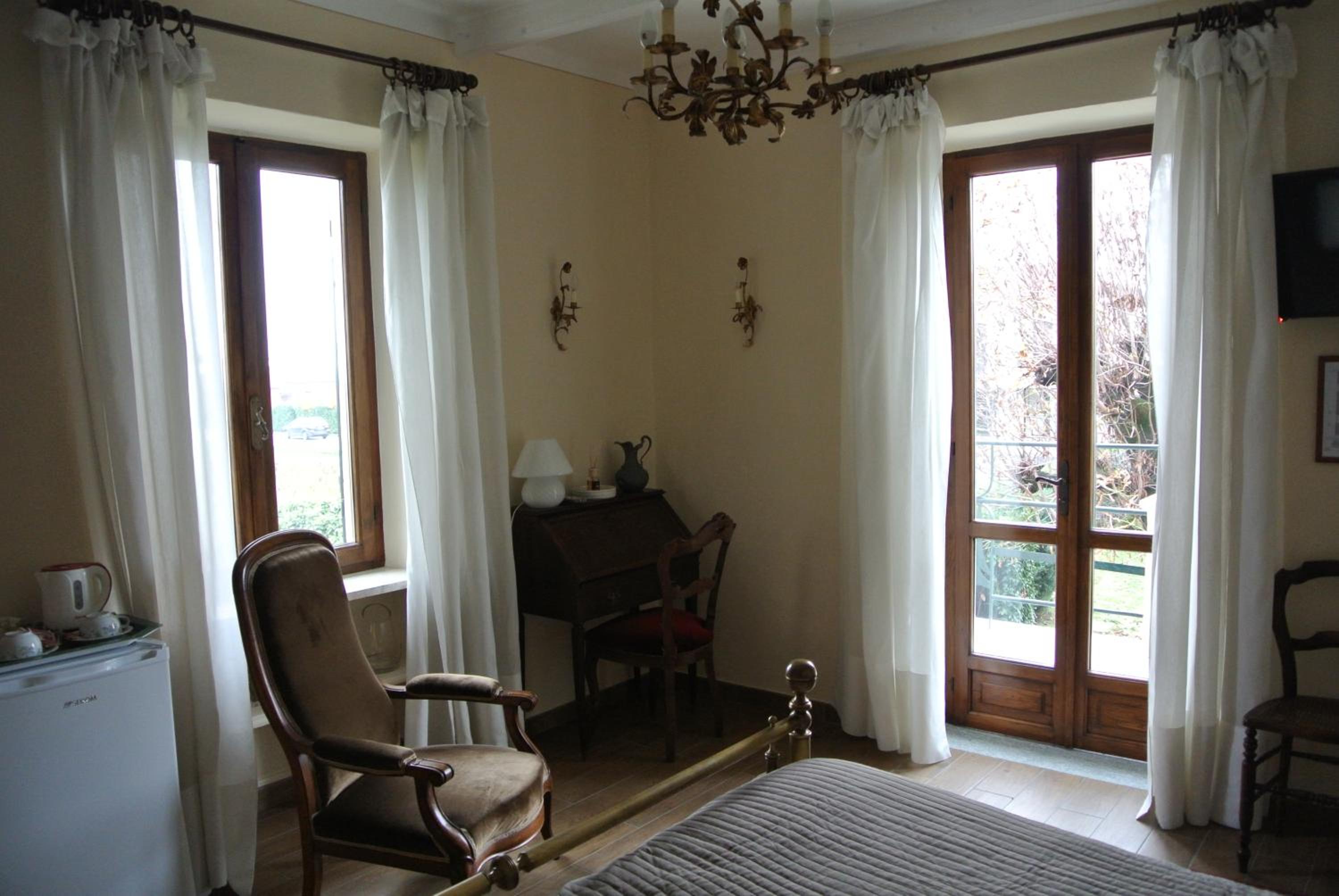 Deluxe Double Room with Balcony - Photo 1