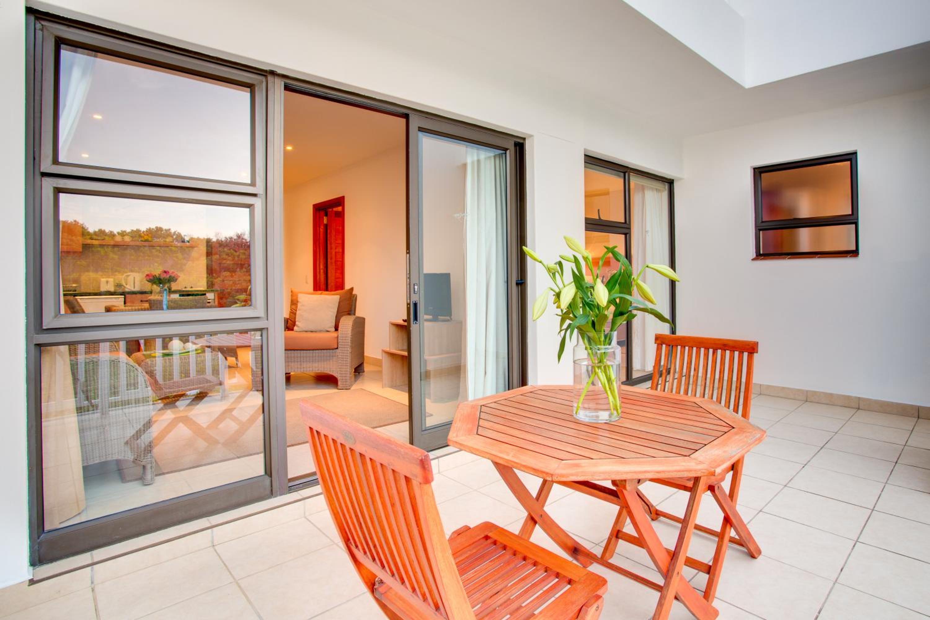 King Suite with Balcony - Photo 16