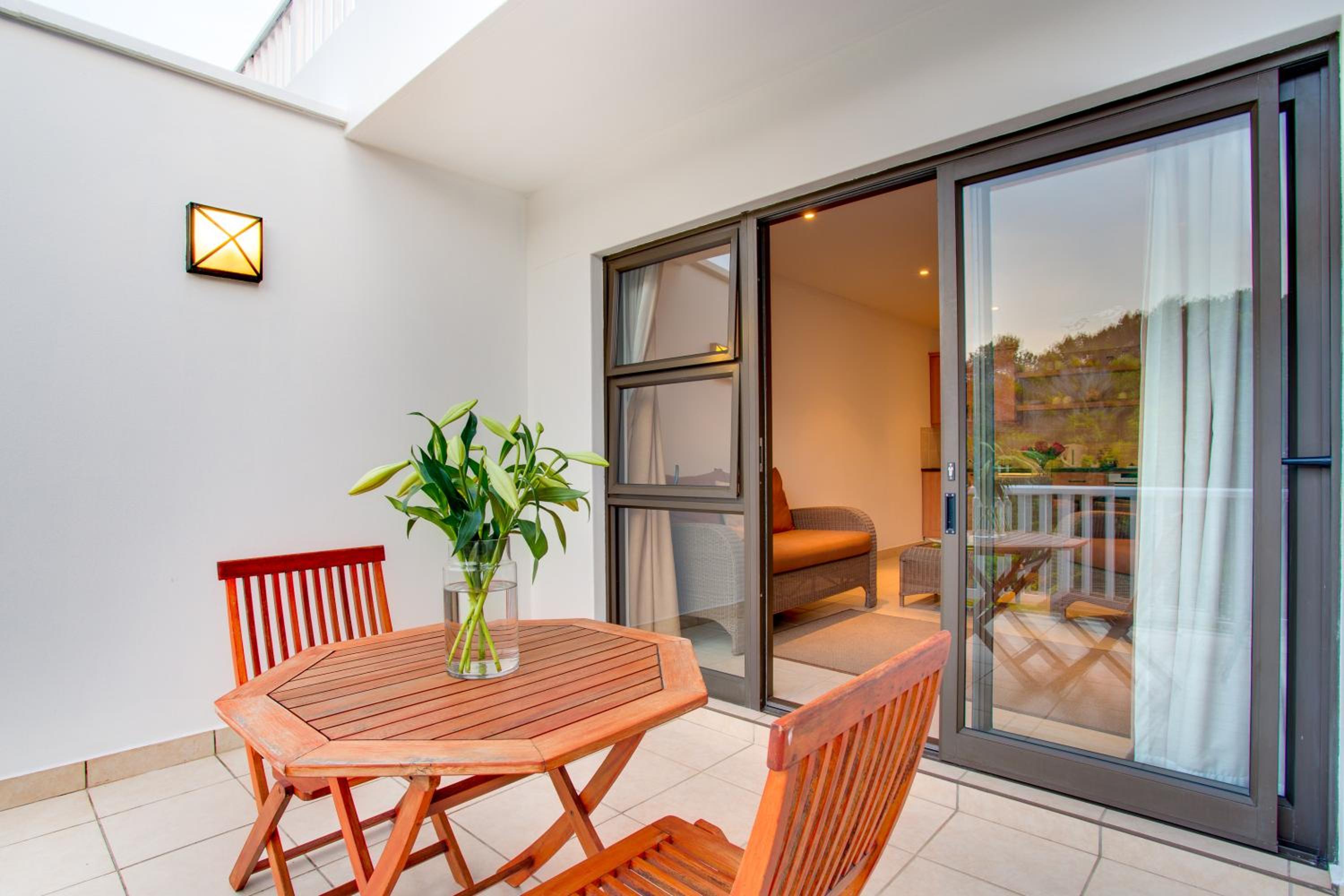 King Suite with Balcony - Photo 17
