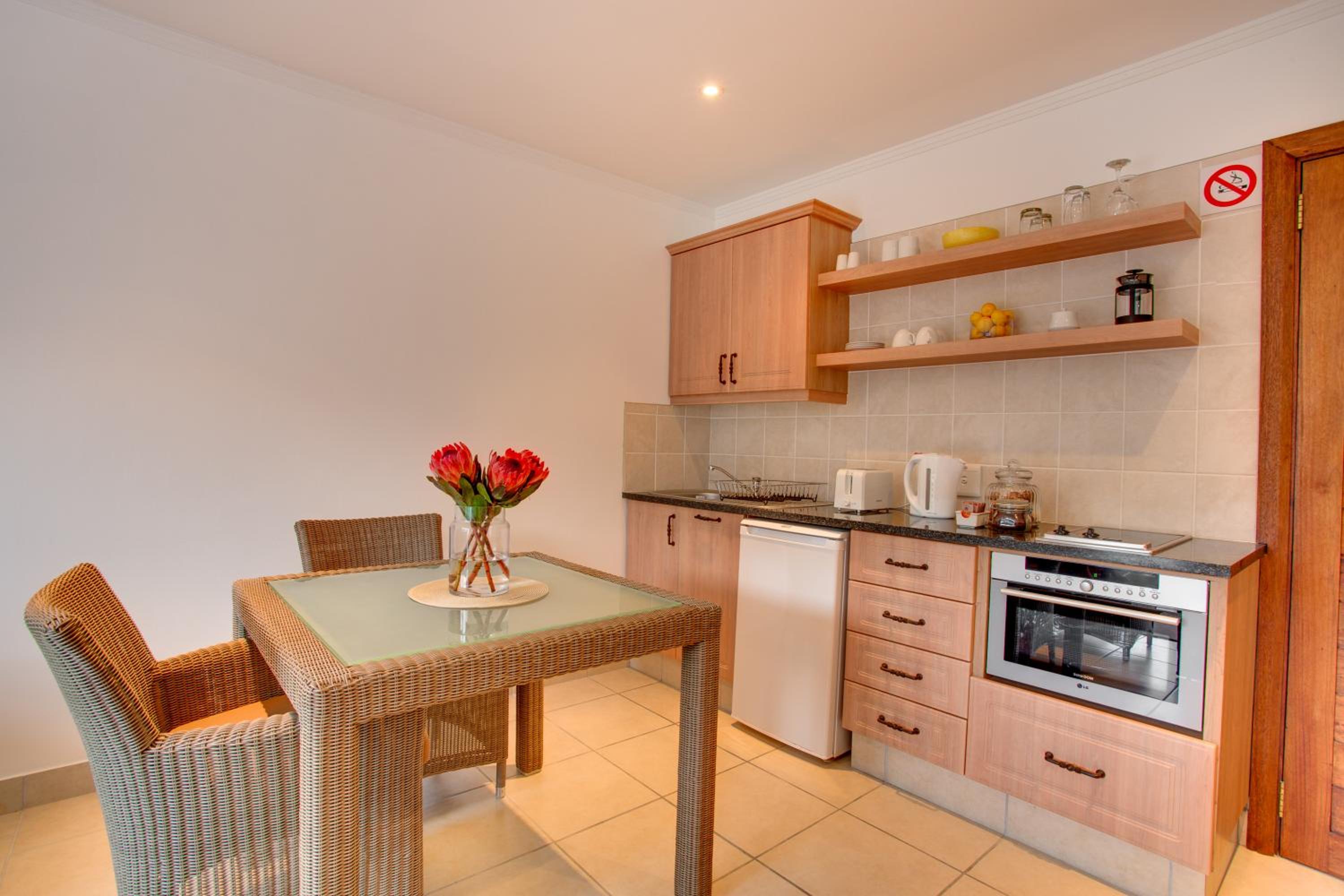 King Suite with Balcony - Photo 24