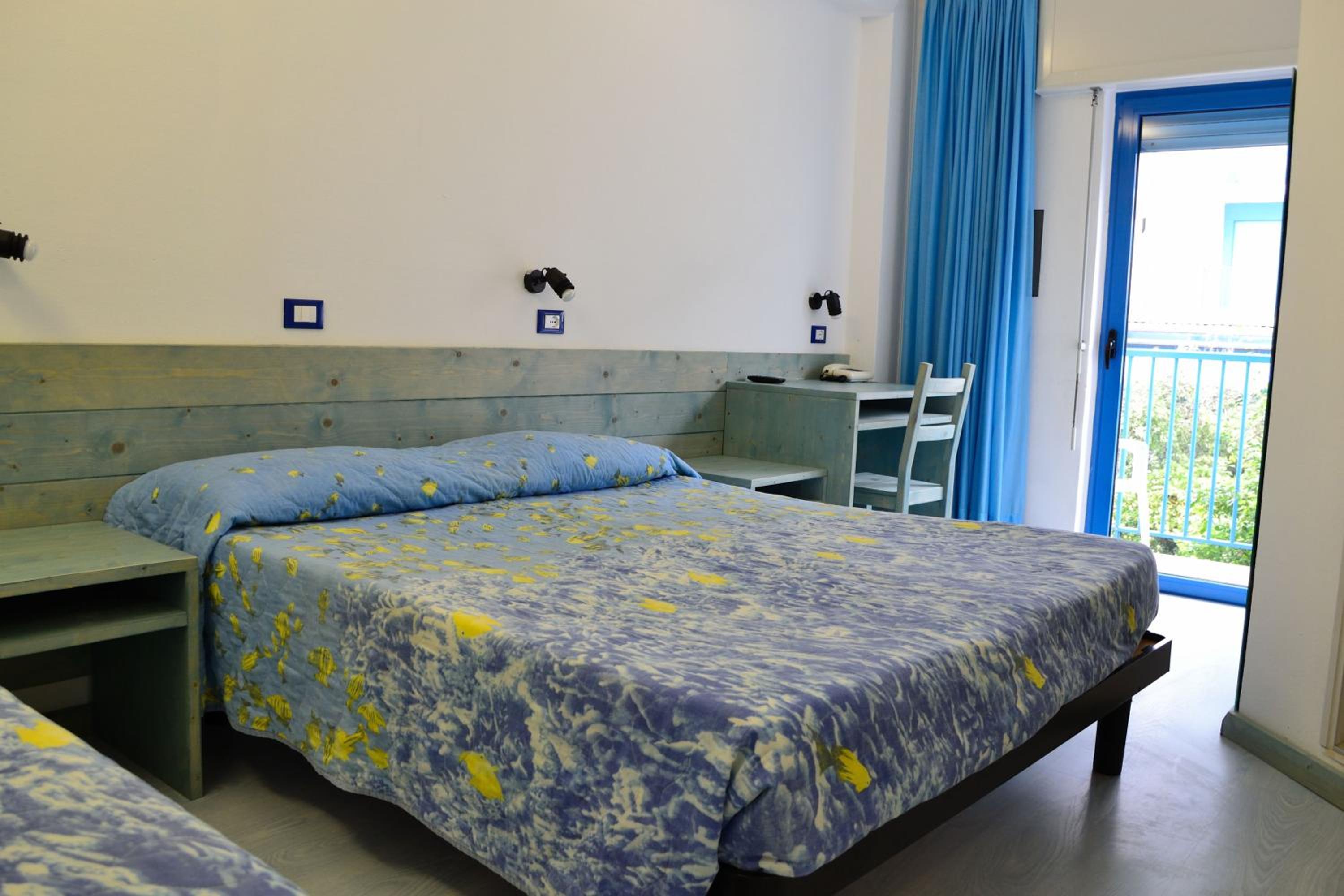 Family Room (2 Adults + 2 Children) with Balcony photo 1