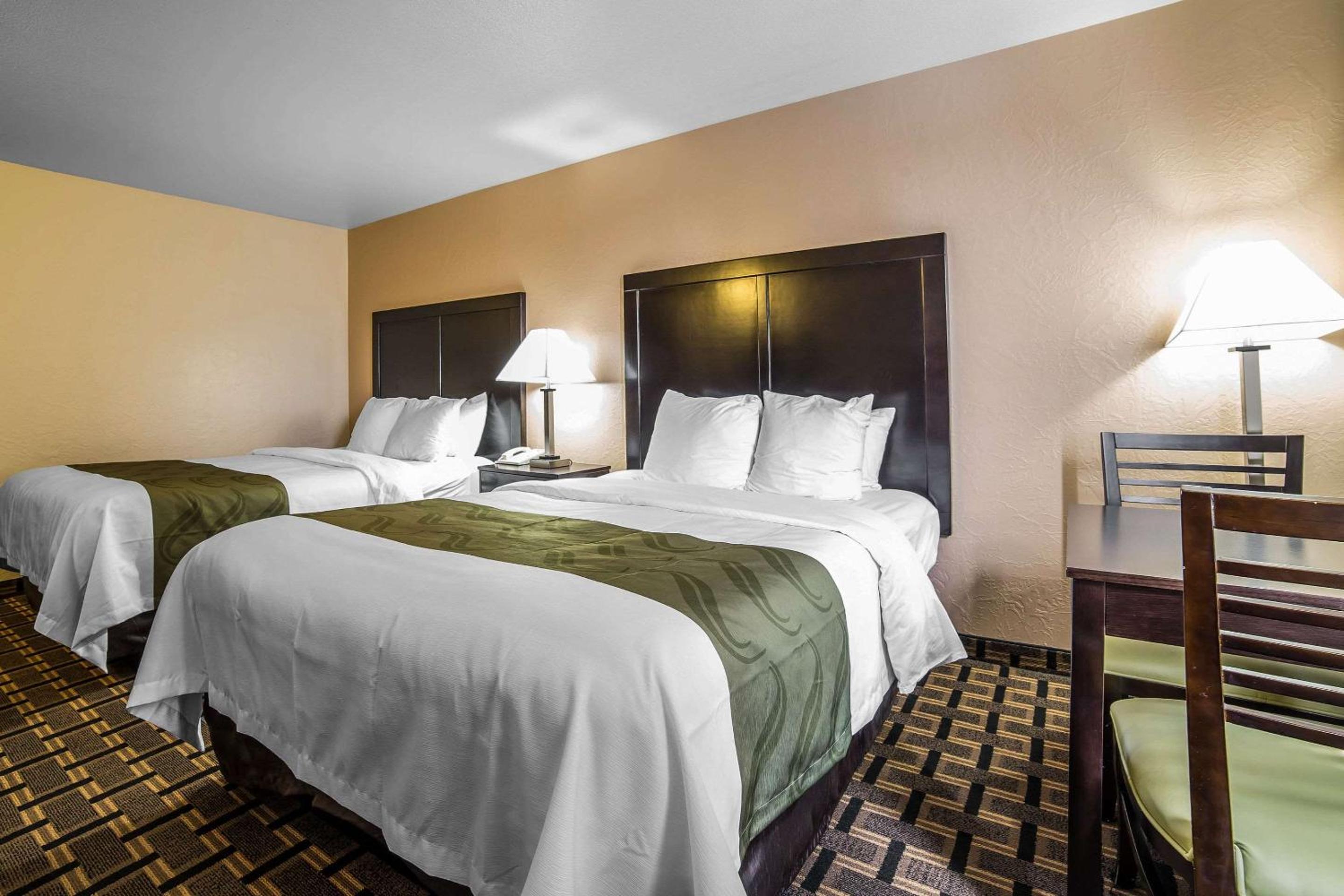 Queen Room with Two Queen Beds- Non-Smoking - Photo 1