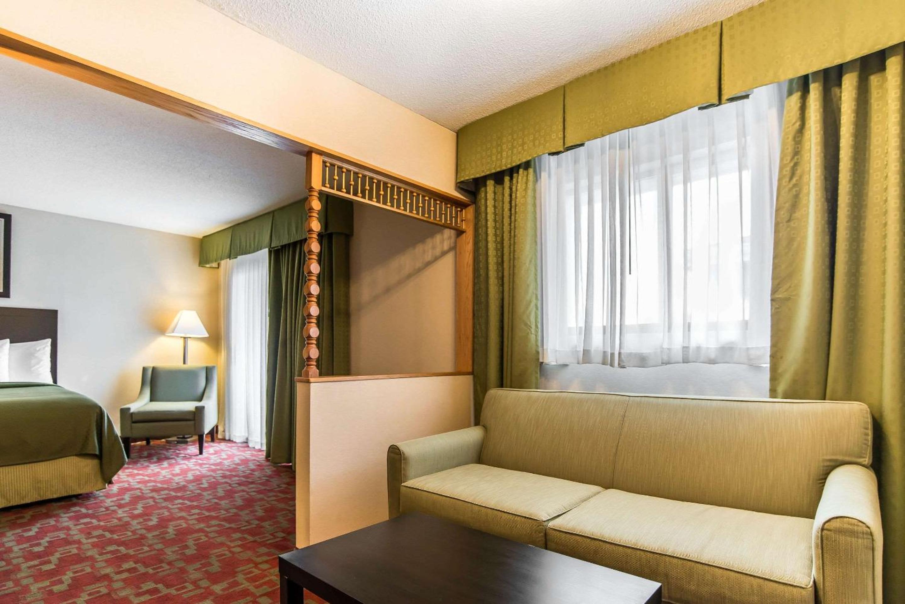 Queen Room with Two Queen Beds and Sofa Bed - Non-Smoking photo 1