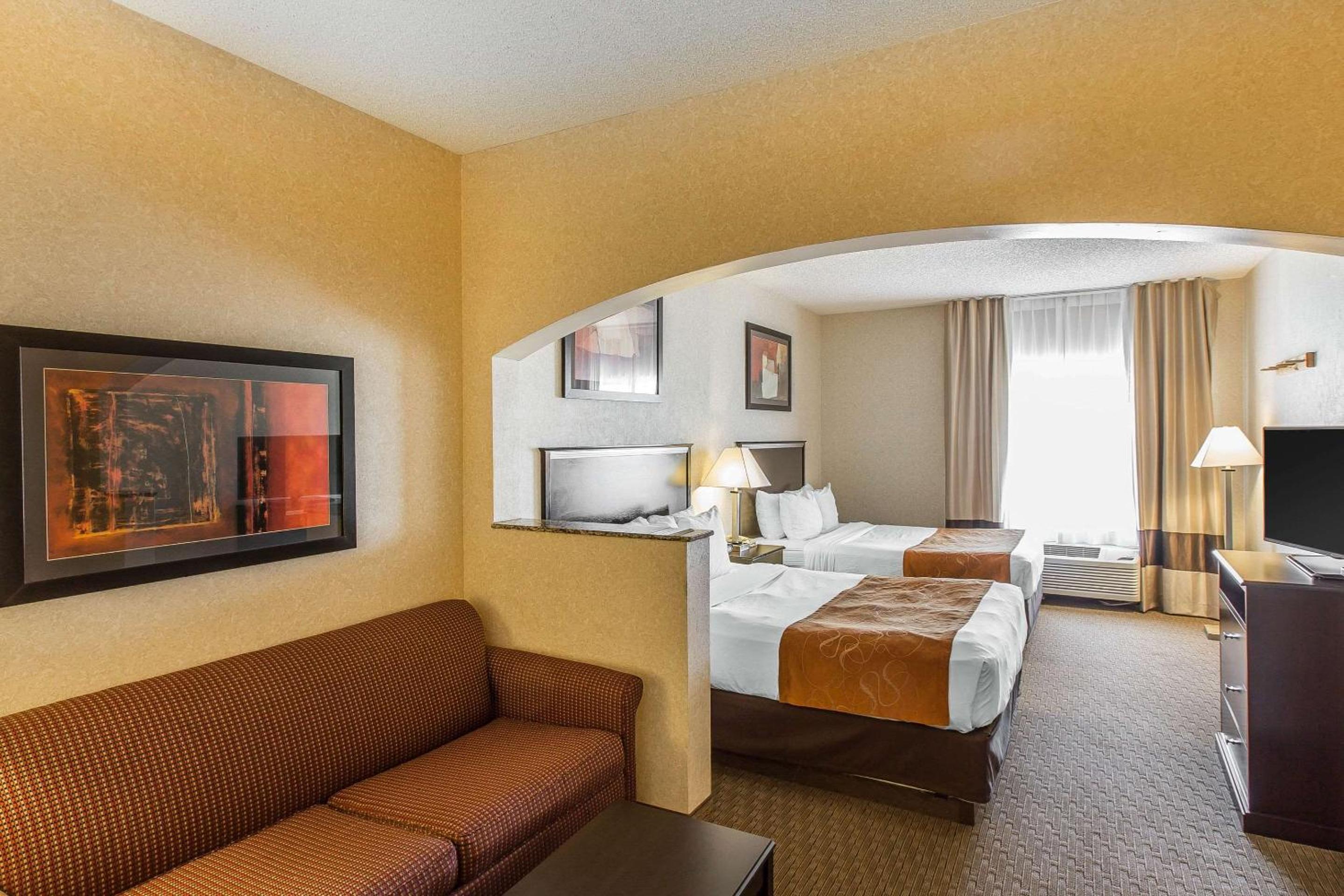 Queen Suite with Two Queen Beds and Sofa Bed photo 1