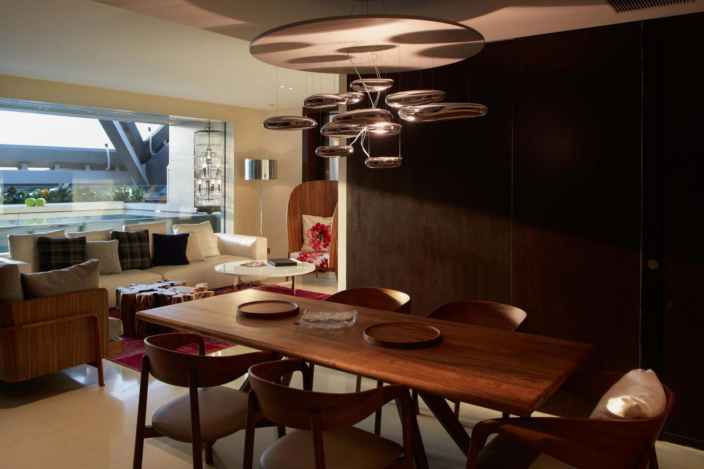 dining table and chairs in the middle of the room
