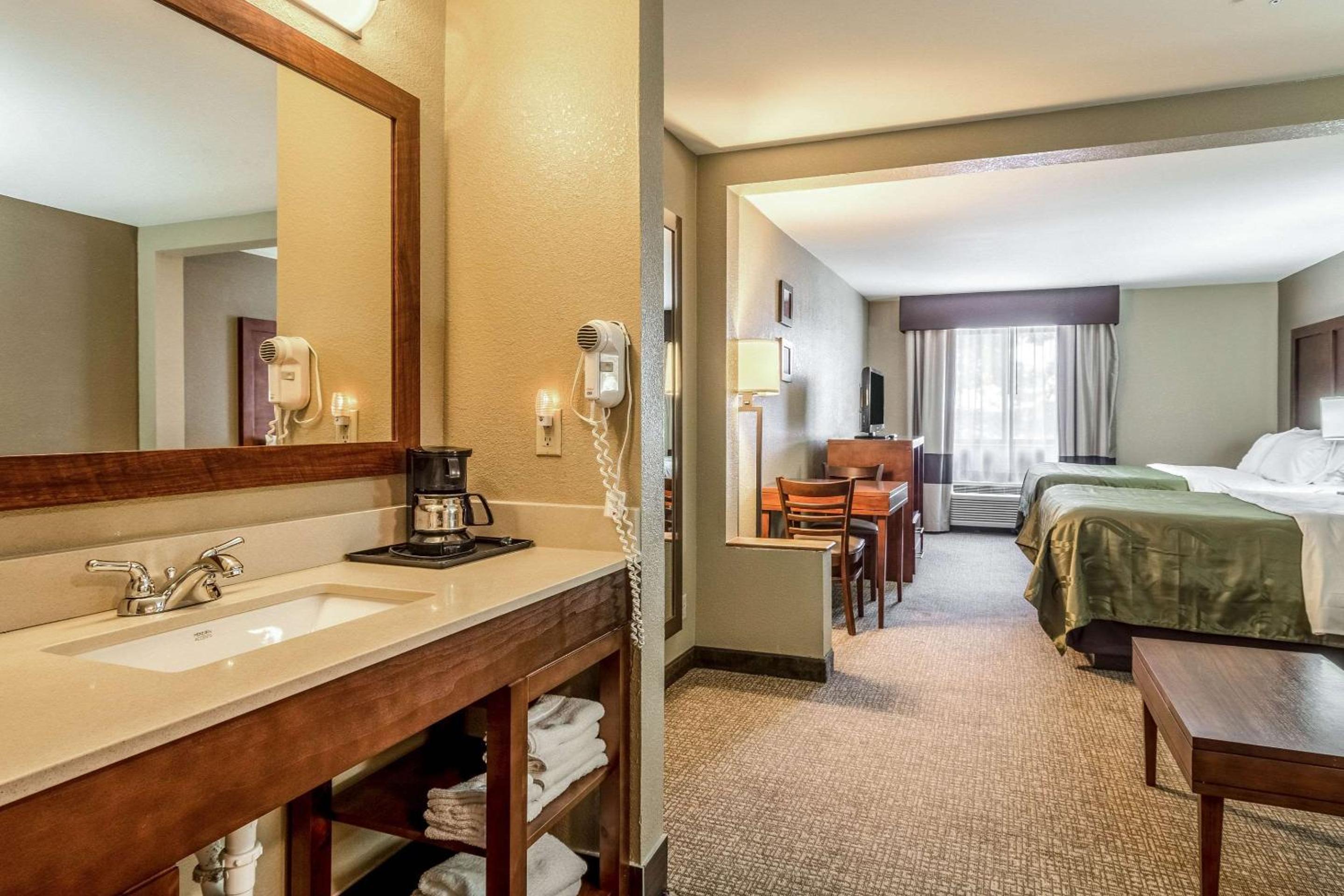 Queen Suite with Two Queen Beds and Sofa Bed photo 1