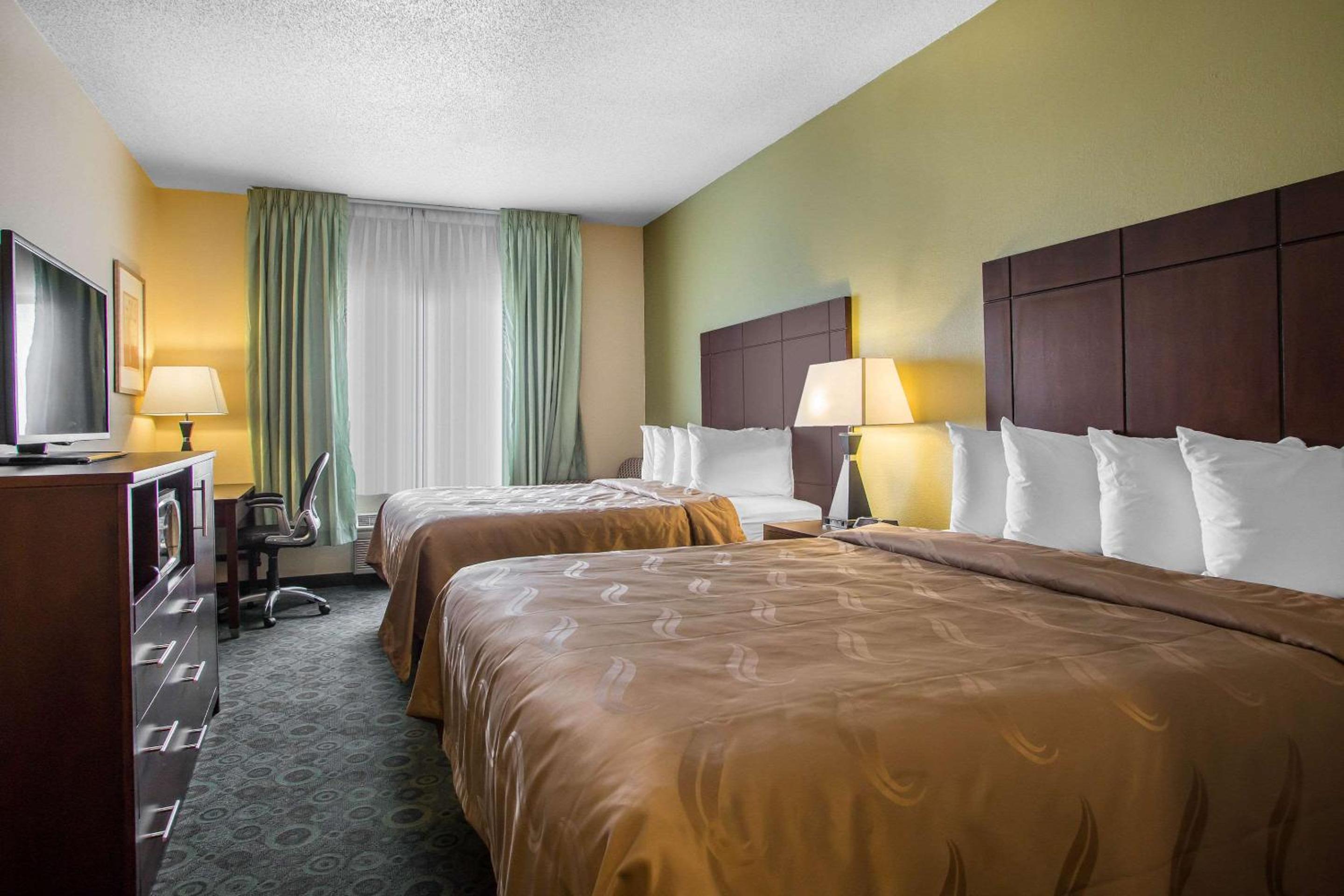 Queen Room with Two Queen Beds - Non-Smoking - Photo 1
