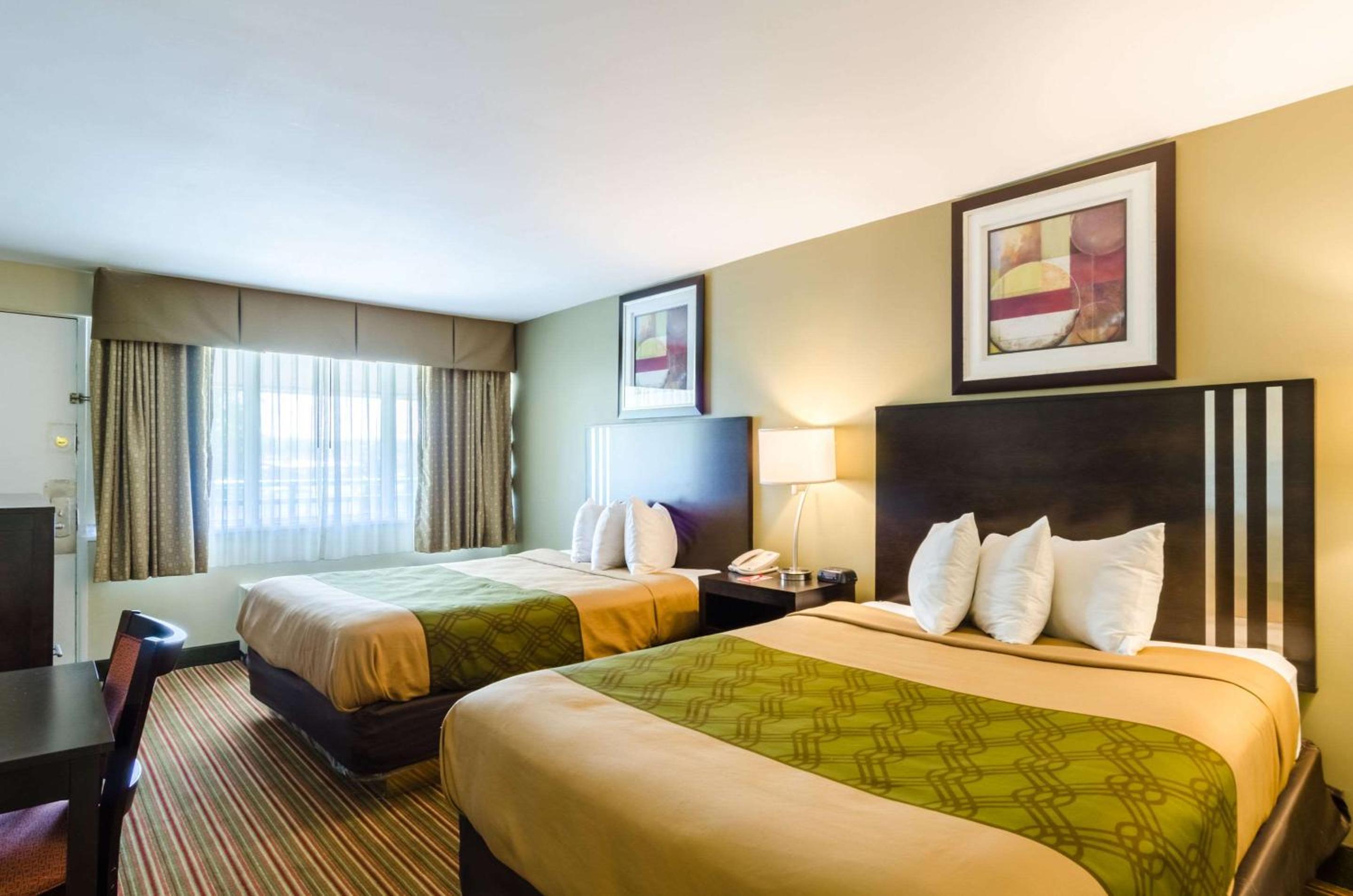 Queen Room with Two Queen Beds - Non-Smoking - Photo 1