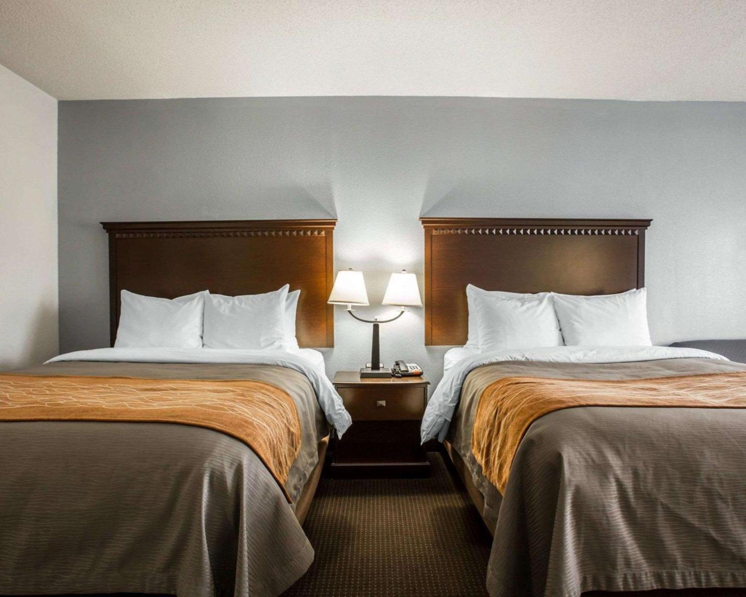 Deluxe Queen Room with Two Queen Beds and Sofa Bed - Non-Smoking - Photo 1