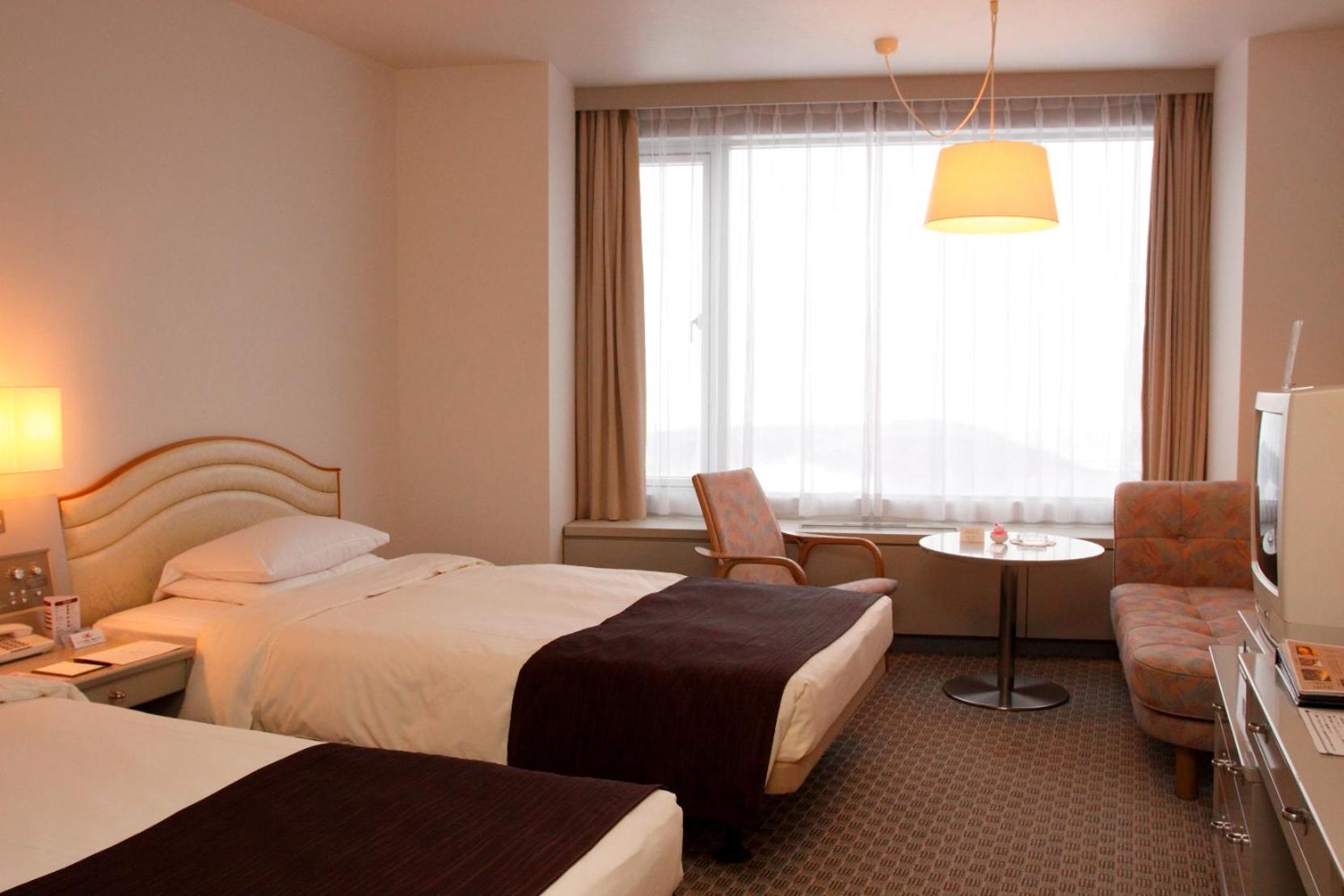 Twin Room - Non-Smoking - Photo 3