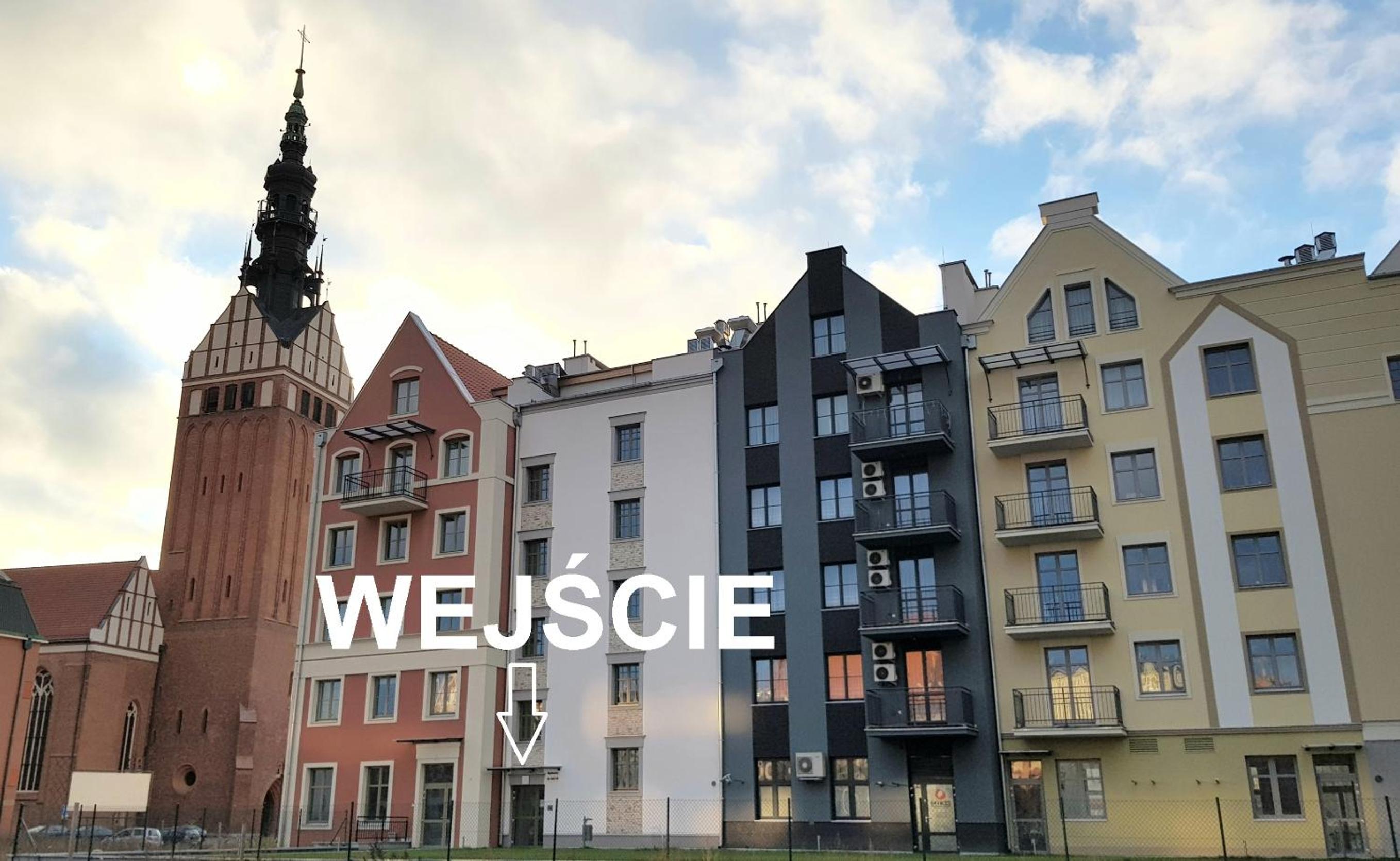 One-Bedroom Apartment with Balcony and City View - Photo 2
