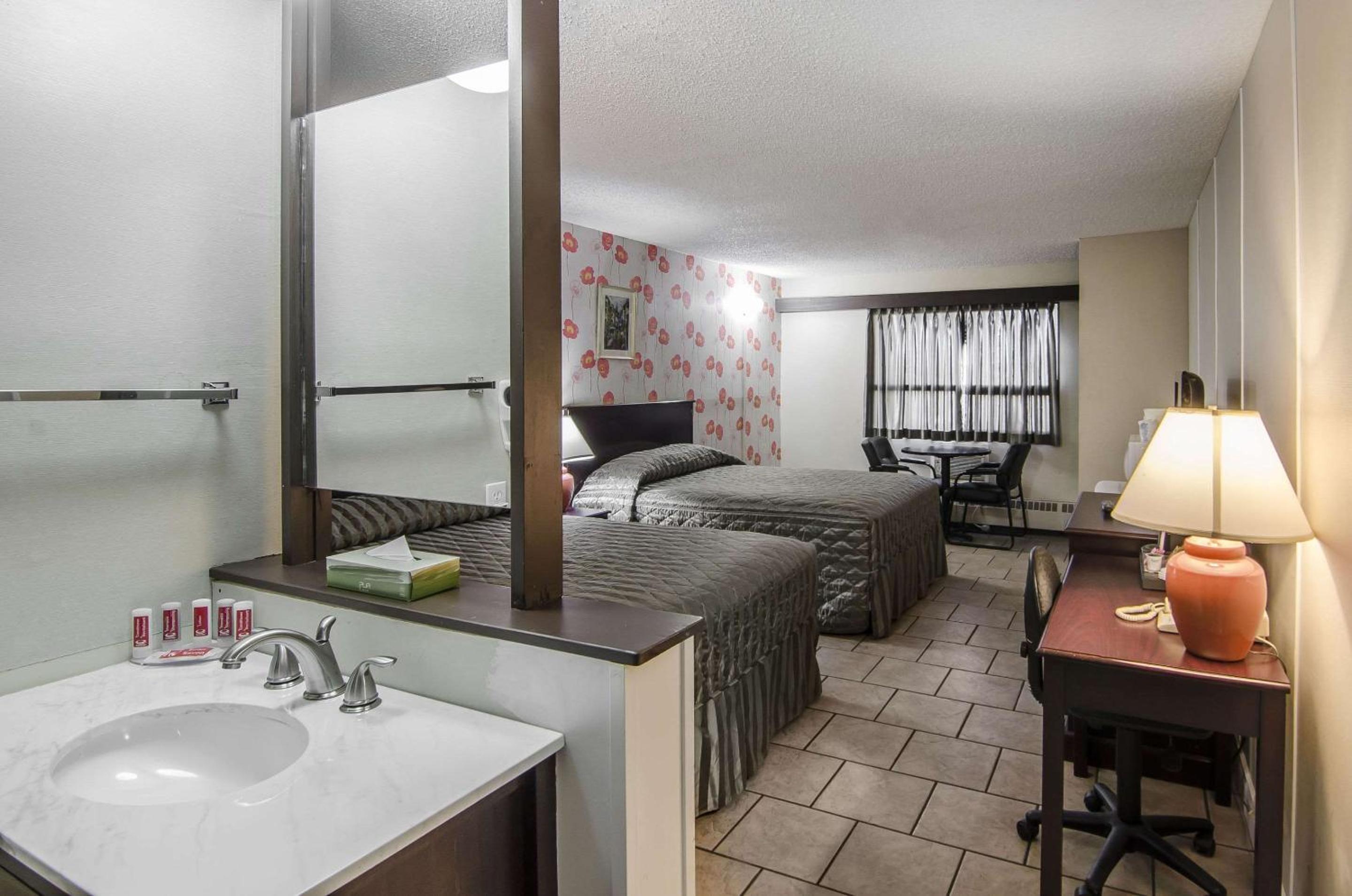 Queen Room with Two Queen Beds - Photo 1