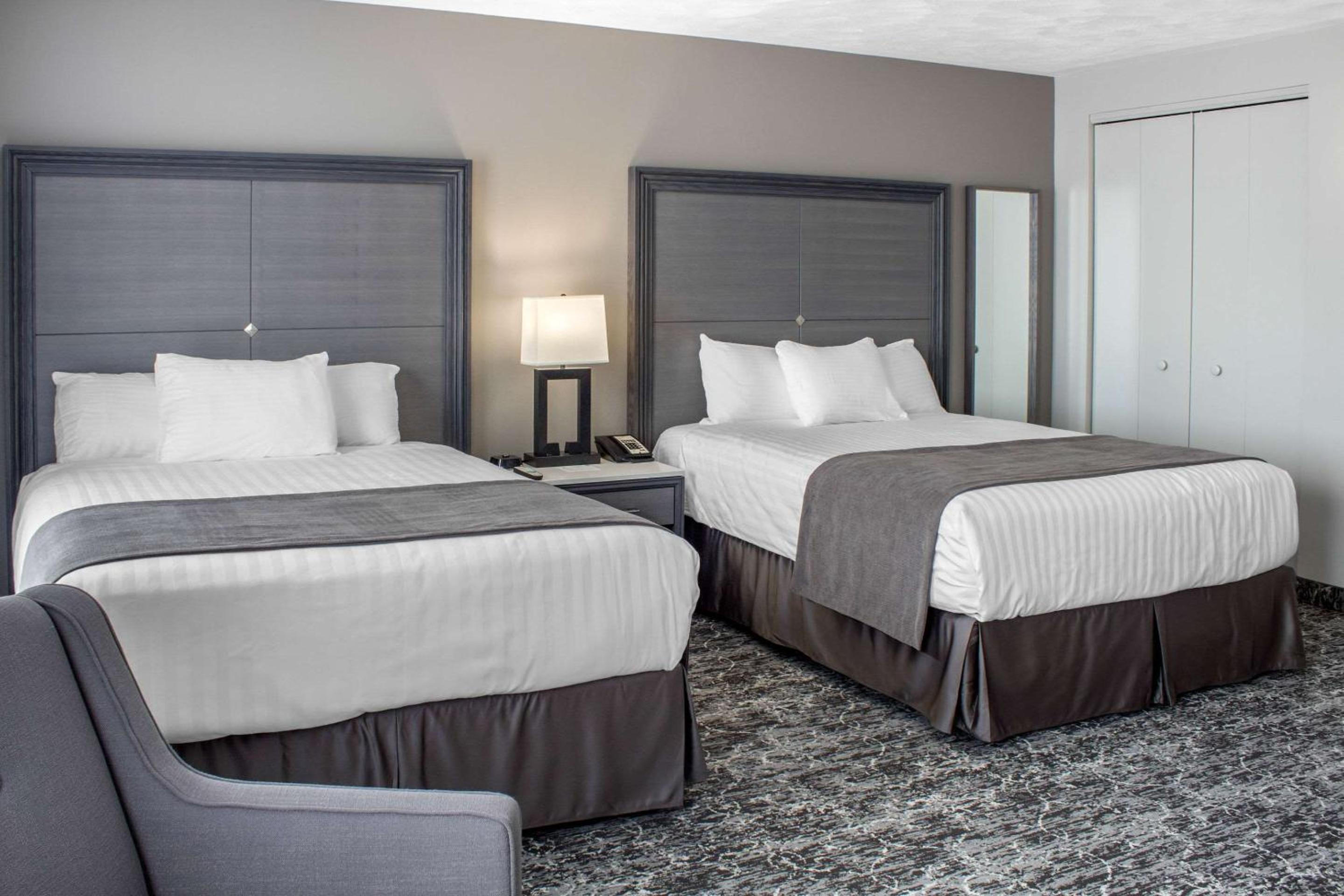 Queen Room with Two Queen Beds and Street View - Non-Smoking - Photo 1