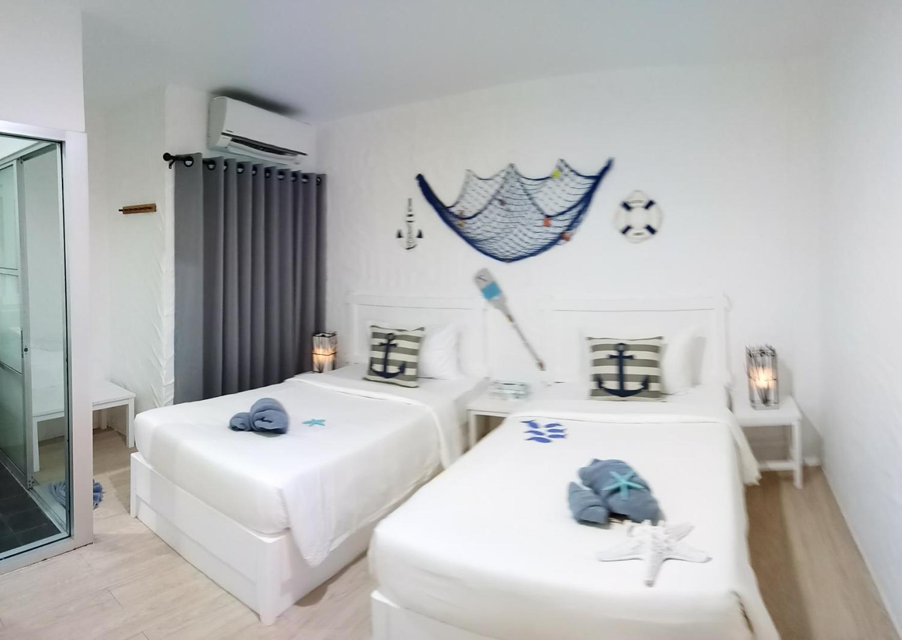 Standard Twin Room - Photo 7