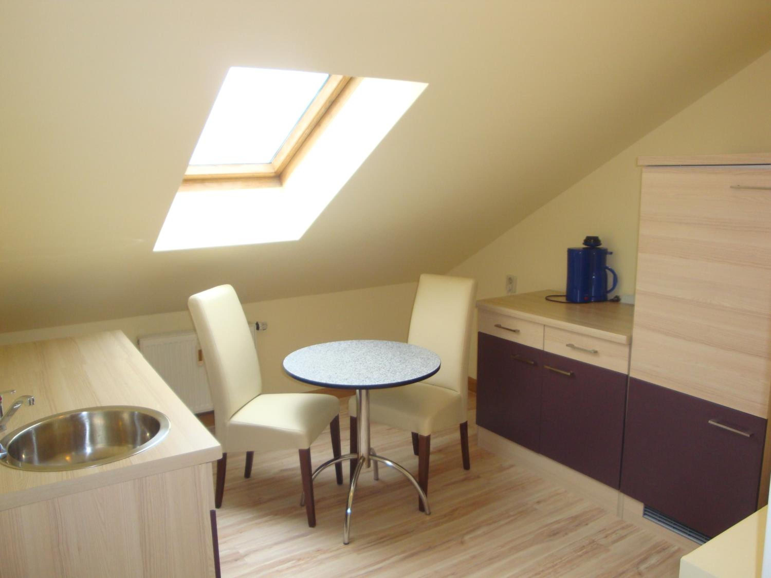 Two-Bedroom Apartment / Family Room - Photo 3