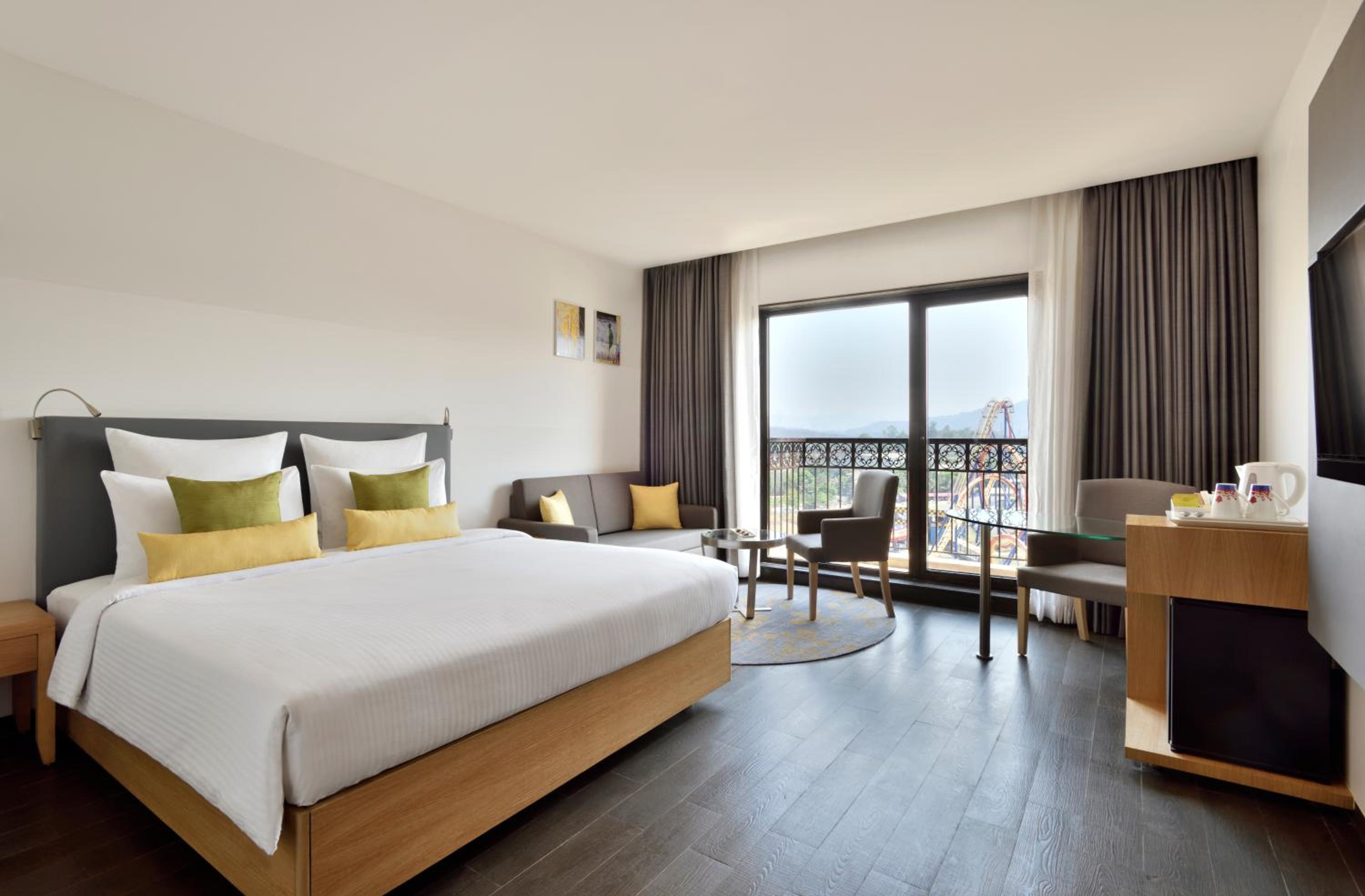 Deluxe King Room with Sofa Bed with Complimentary one free ticket for Trampoline Park at Imagicaa per room per stay and 20% discount on Food and Beverage - Photo 1