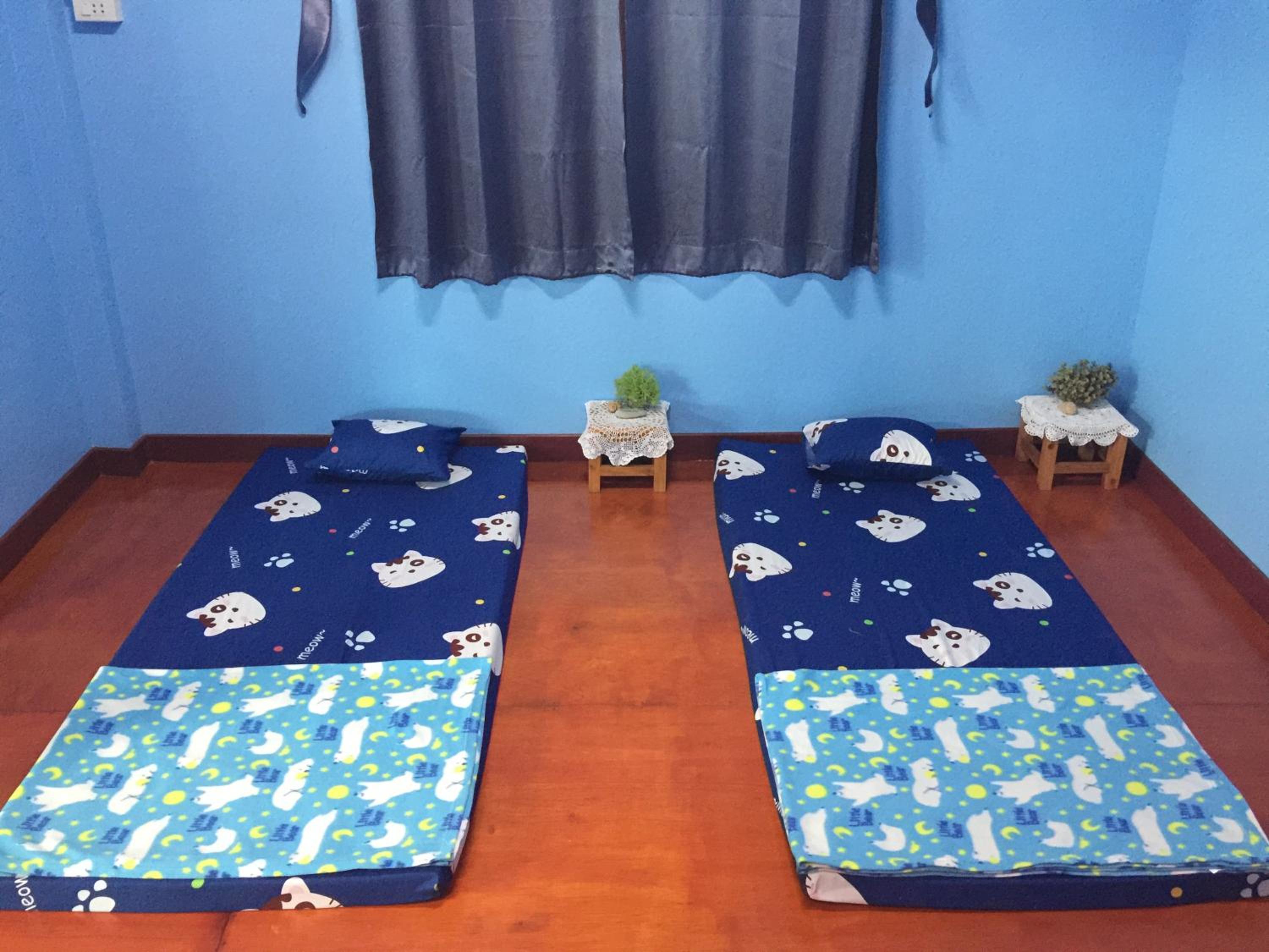 Single Bed in Dormitory Room