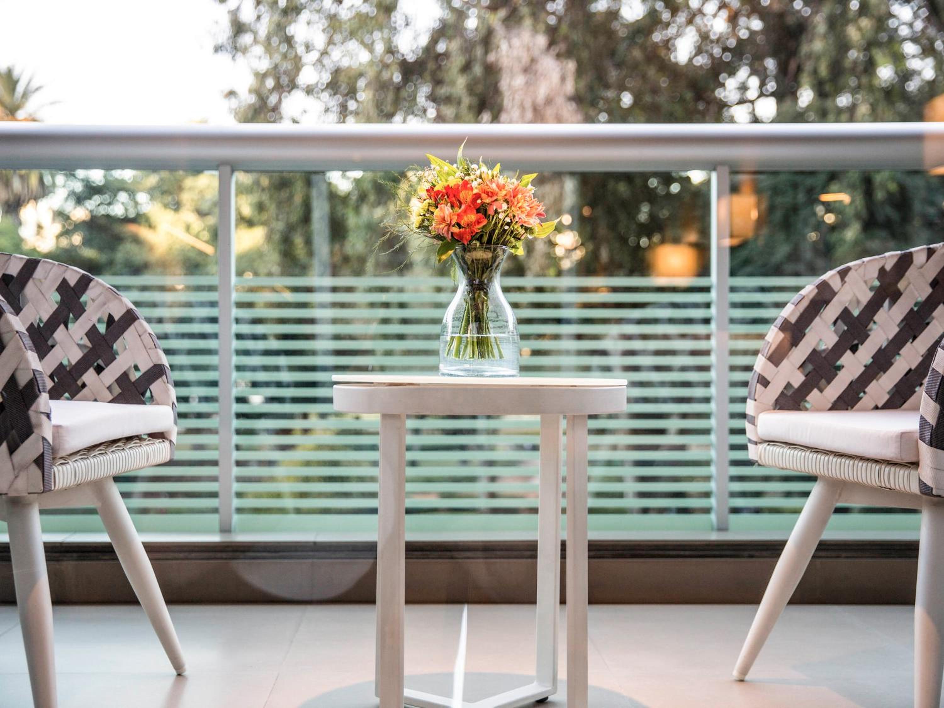 Deluxe Suite with Two Double Beds, Balcony and Park View