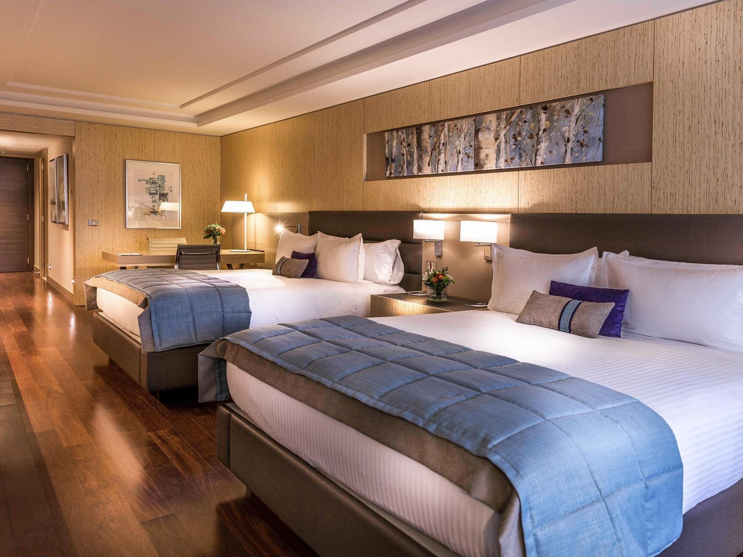 Deluxe Suite with Two Double Beds, Balcony and Park View thumbnail 6