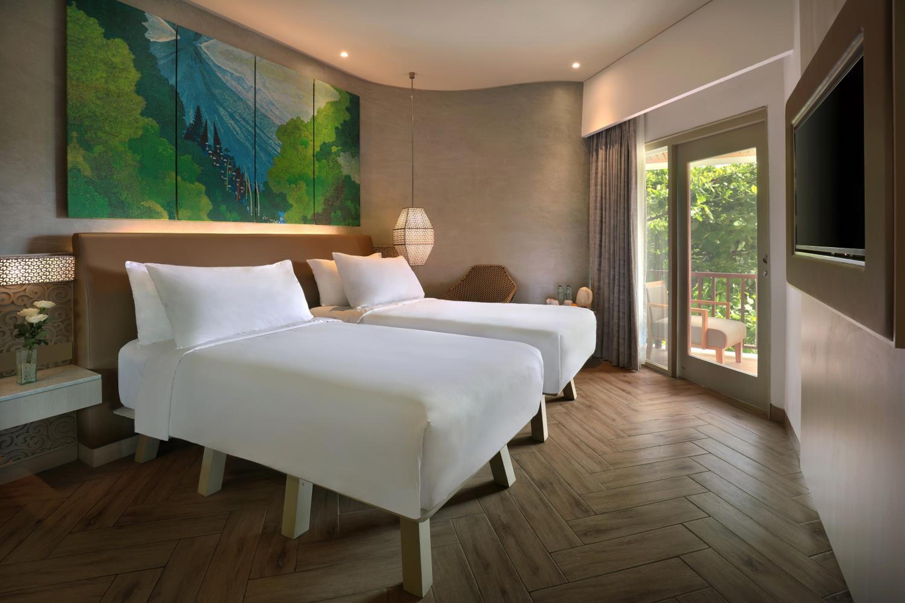 Deluxe Twin Room with Balcony and Free Benefit - Photo 1