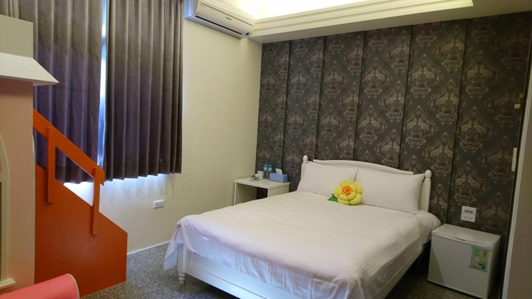 Triple Room (2 Adults + 1 Child under 55 in)