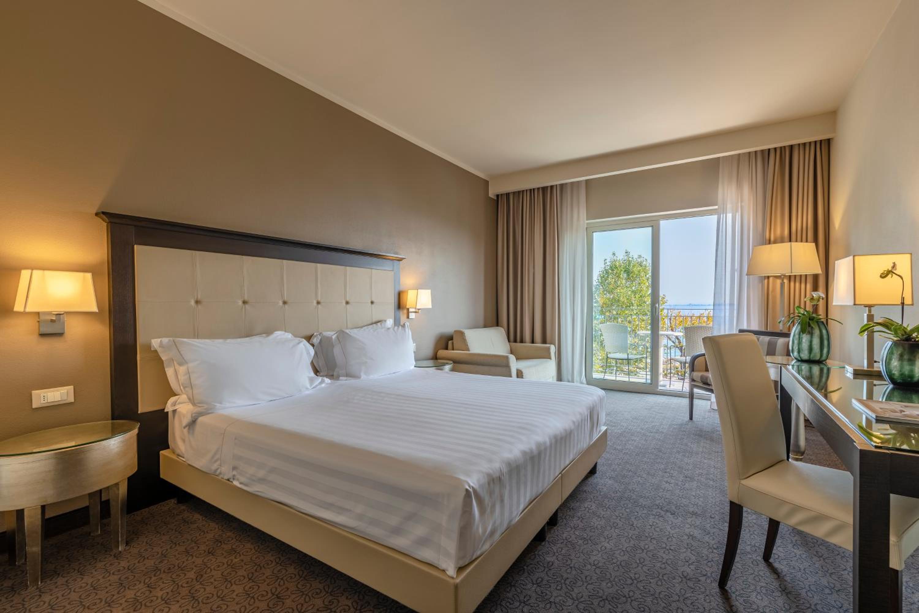 Junior Suite with Balcony and Lake View - Photo 1