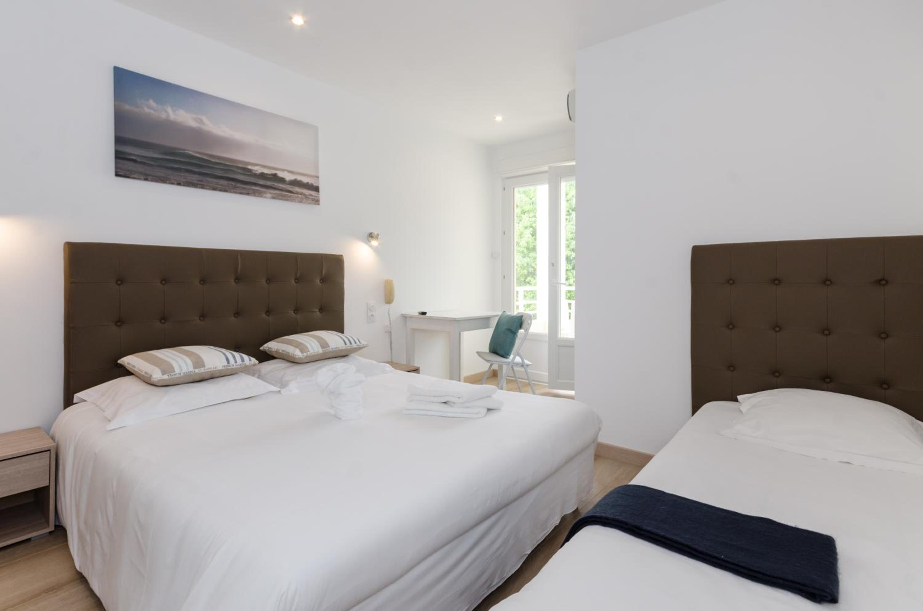 Triple Room with Balcony - Photo 1