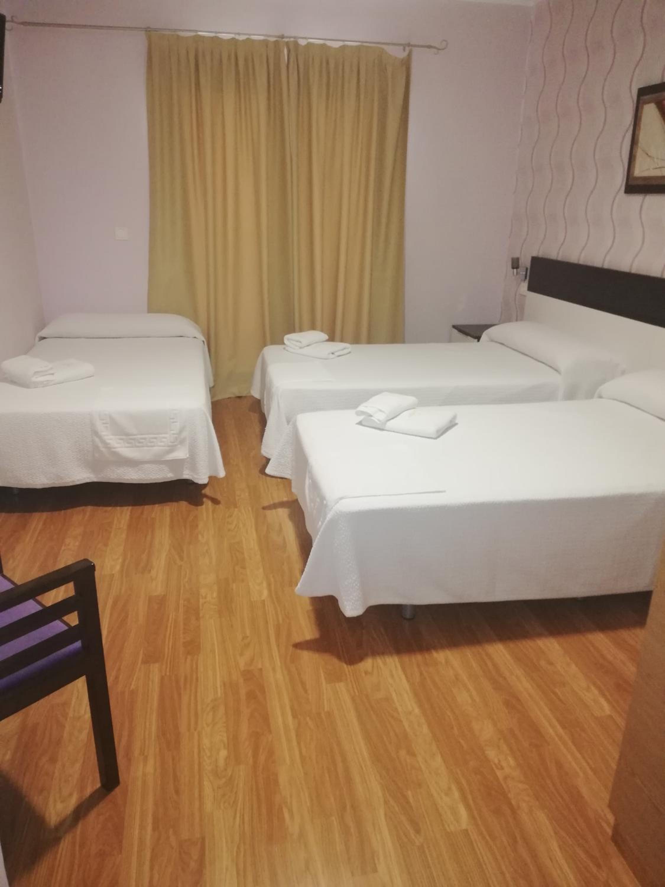 Triple Room - Photo 1