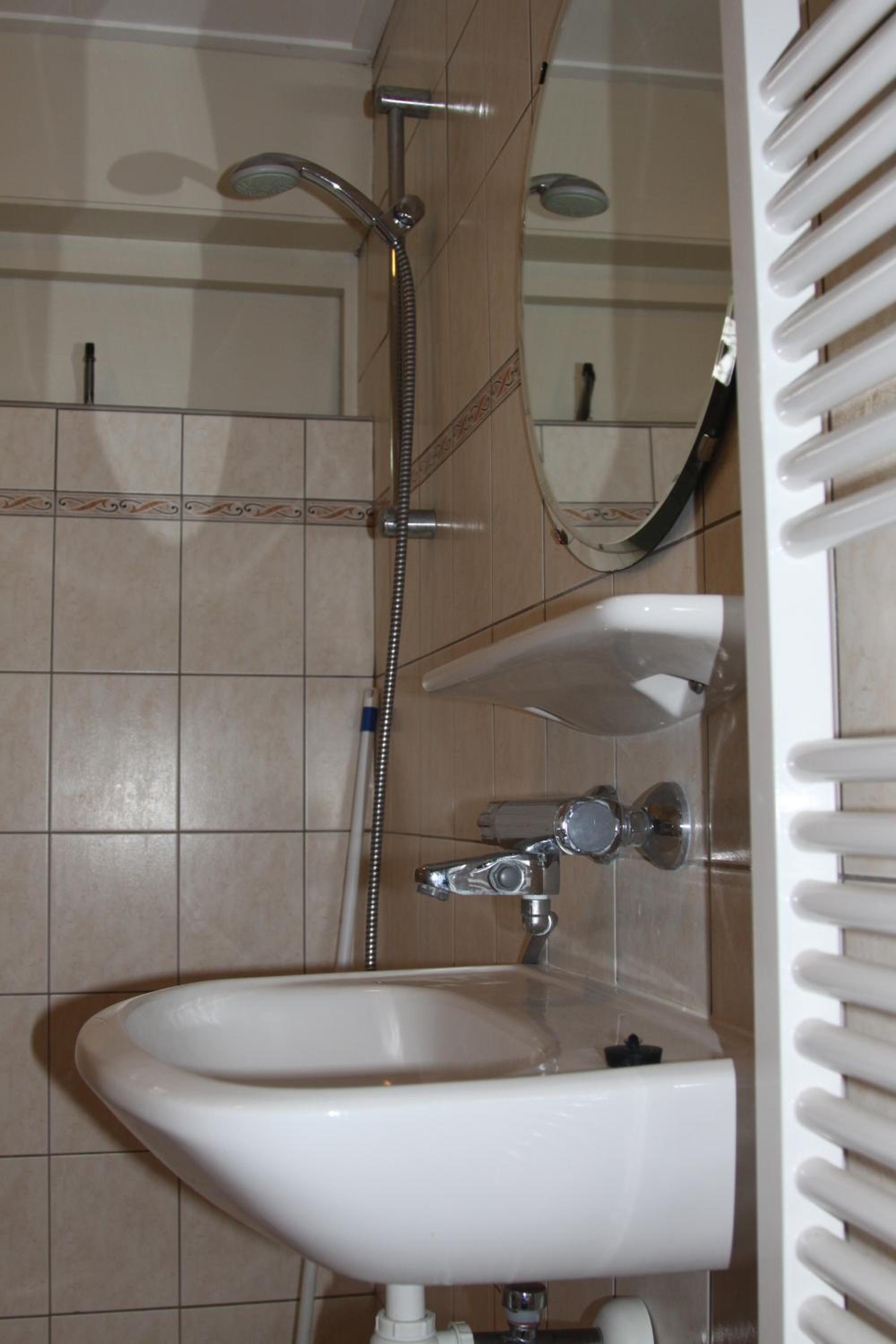 Double Room with Shared Shower and Toilet photo 2