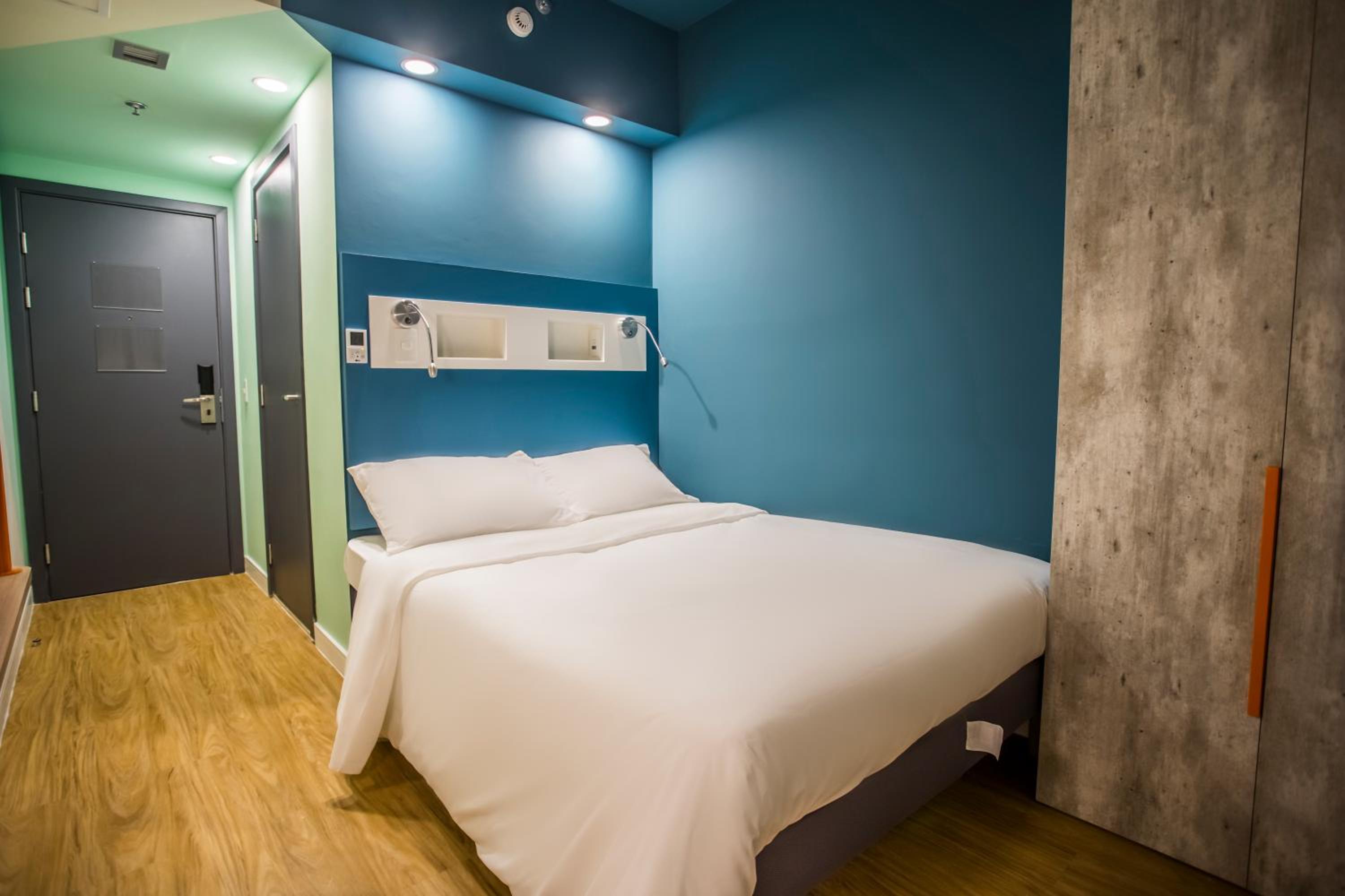 Triple Room with Double bed and Single Bed - Photo 1