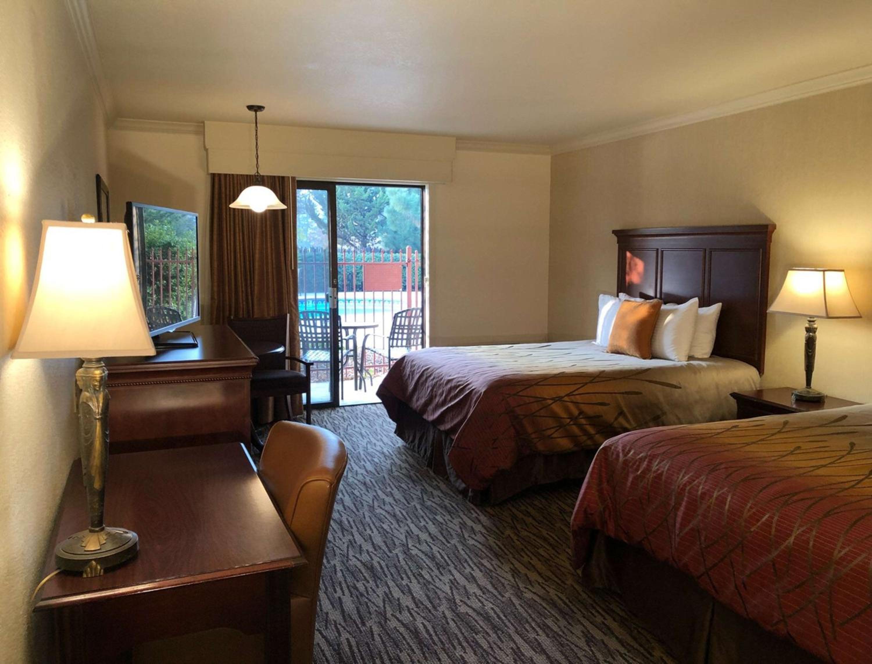 Queen Room with Two Queen Beds and Balcony - Non-Smoking photo 1