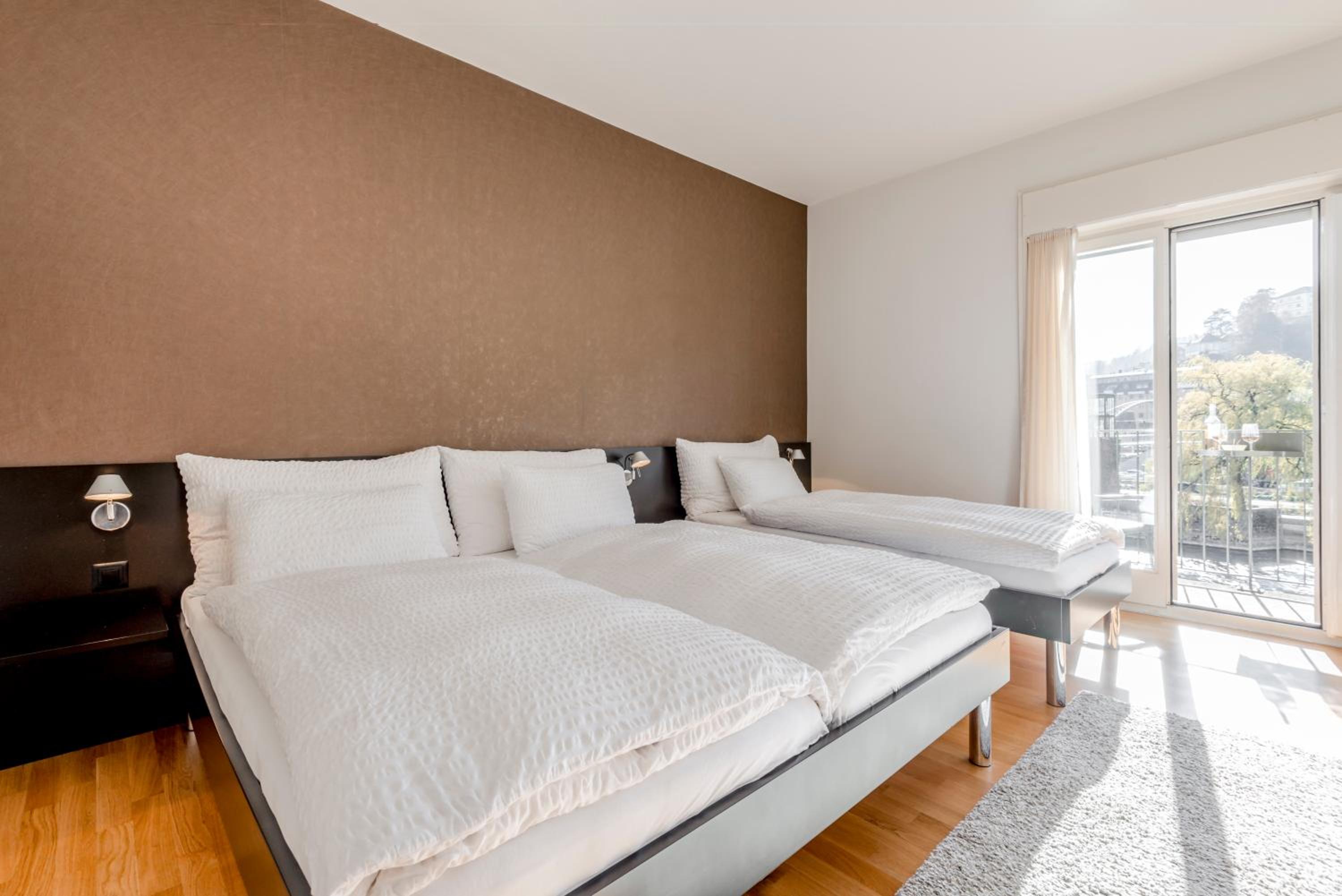 Triple Room with Balcony and River and Mountain View photo 1