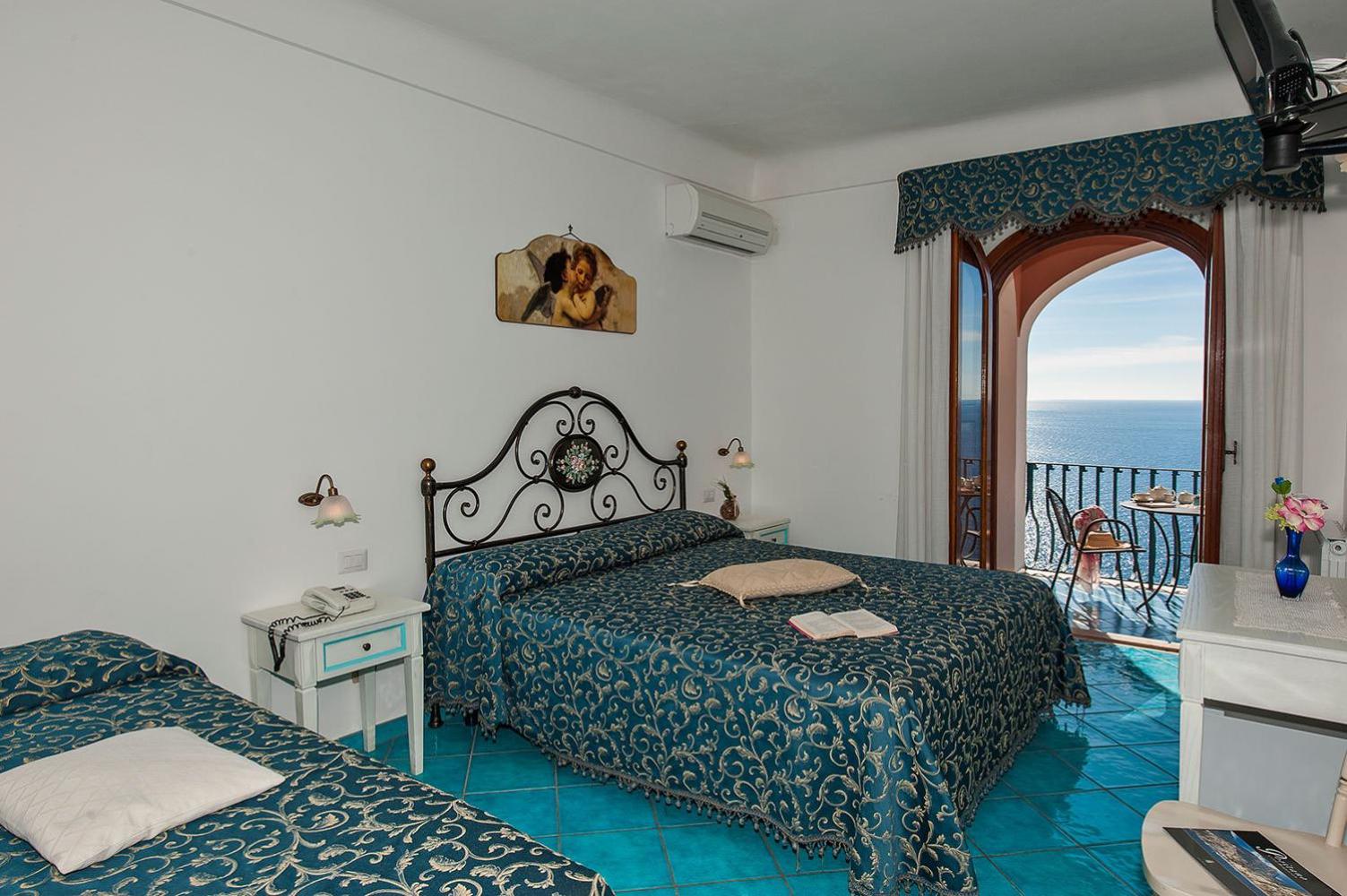 Triple Room with Balcony and Sea View