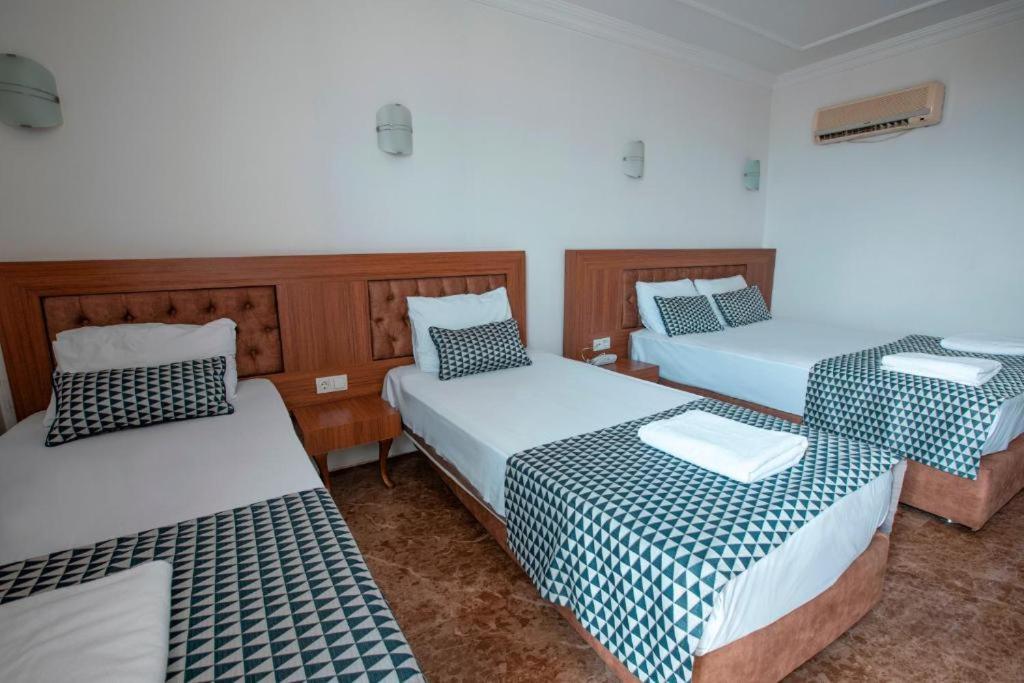 Quadruple Room with Side Sea View