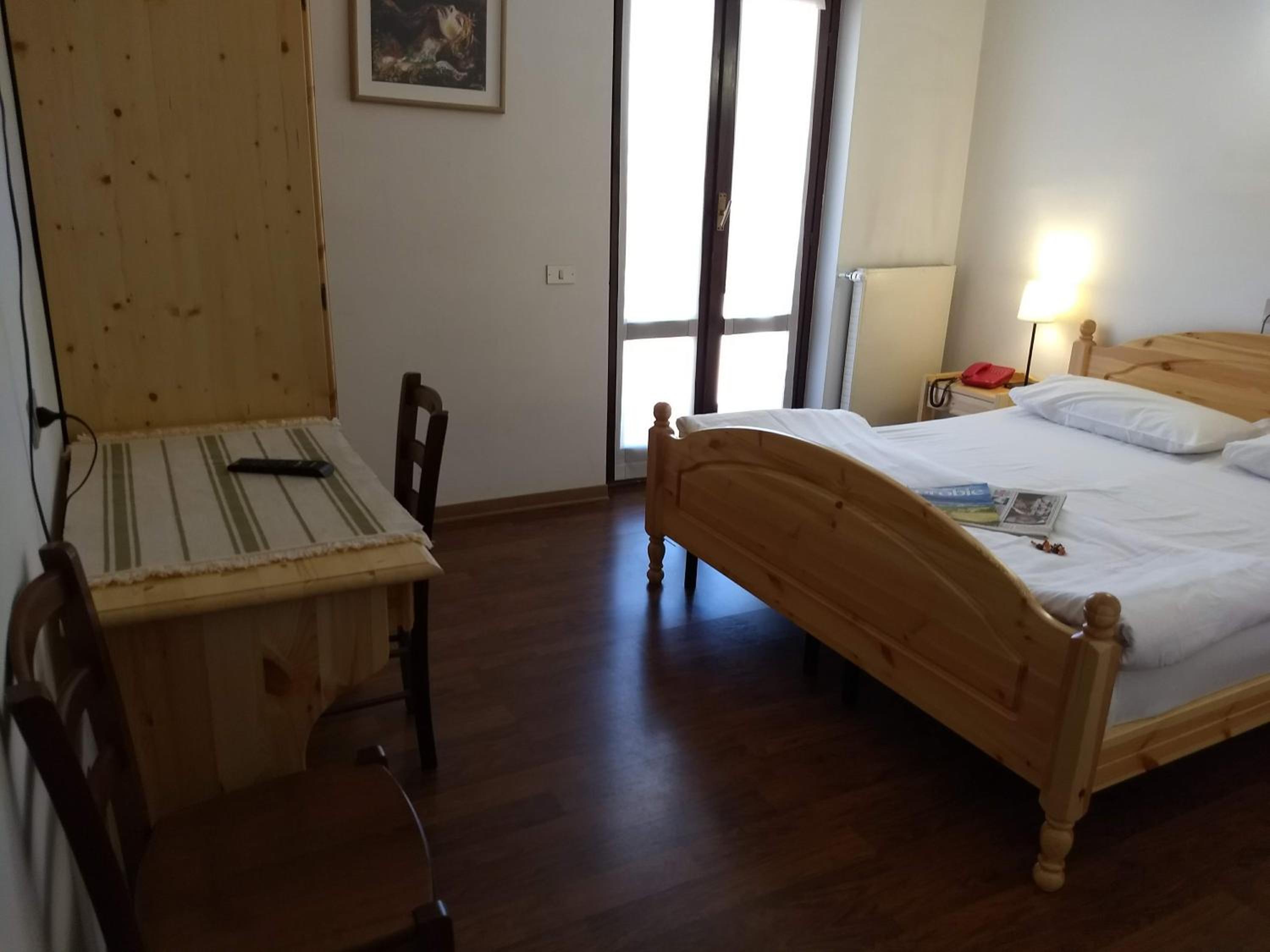 Quadruple Room with Balcony - Photo 1