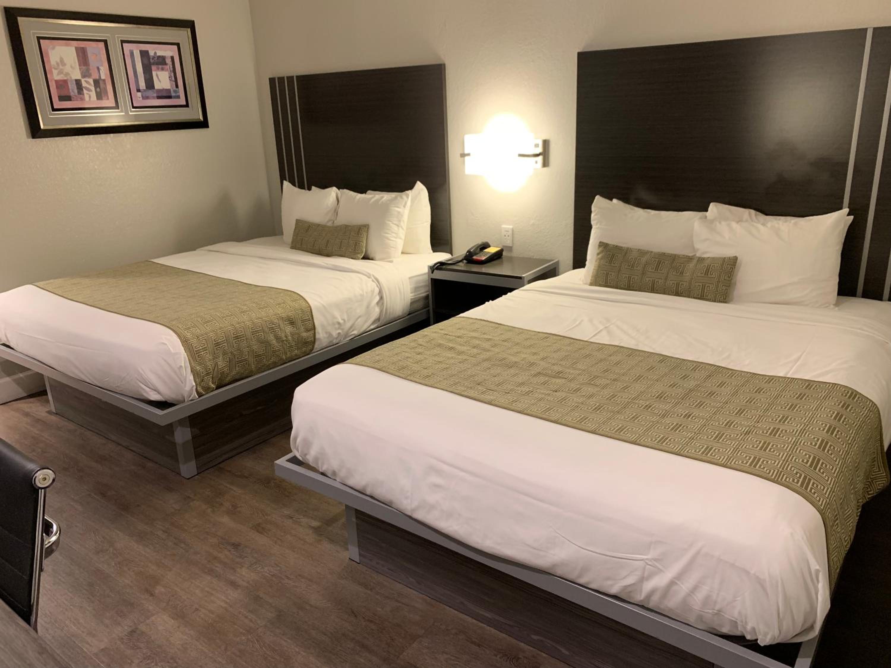 Deluxe Queen Room with Two Queen Beds - Photo 1