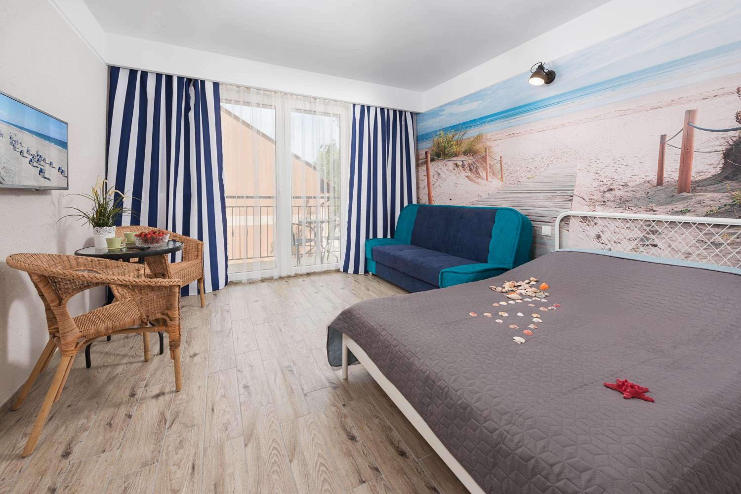 Deluxe Triple Room with Balcony photo 2