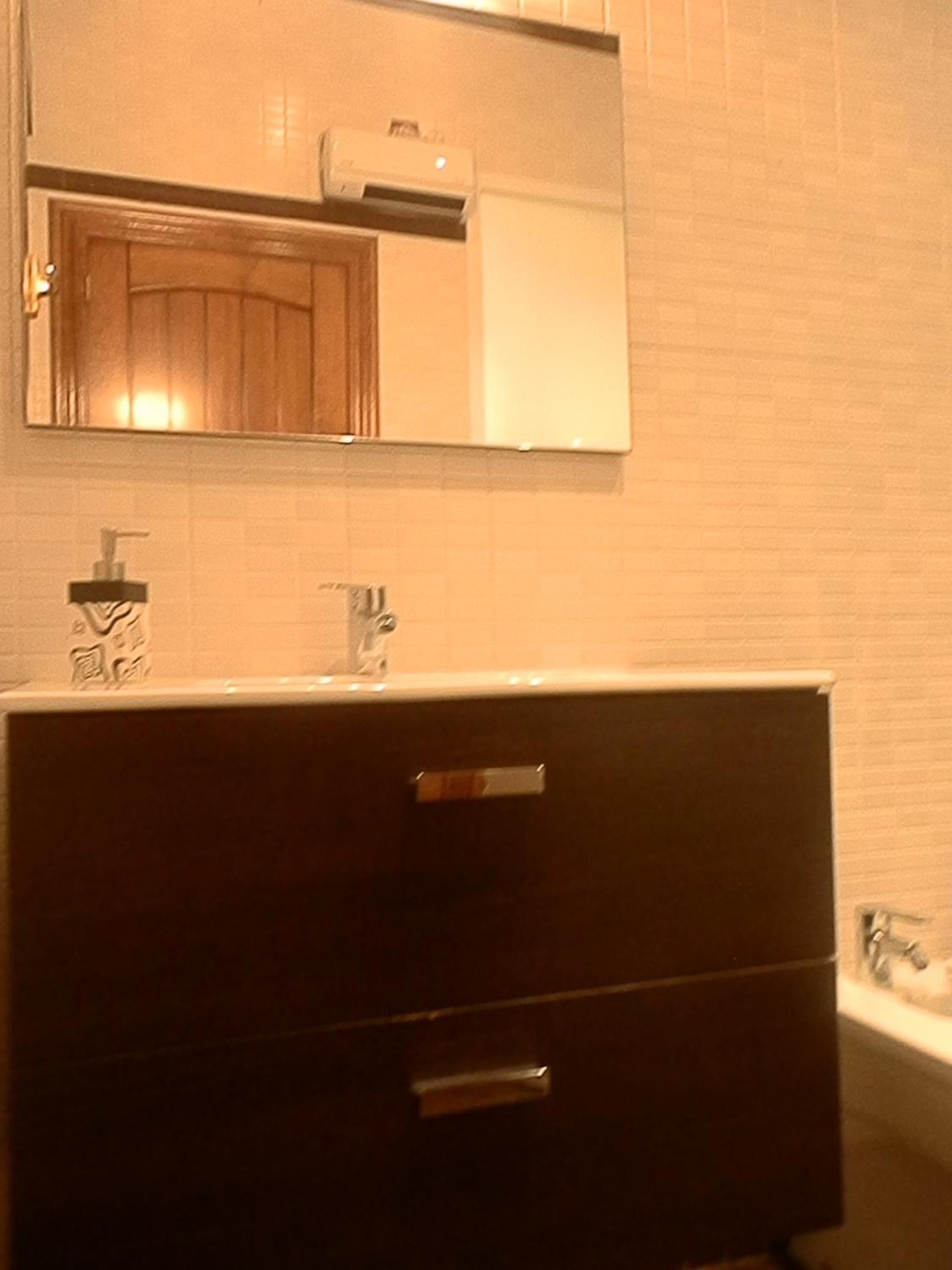 Two-Bedroom Apartment - Photo 16