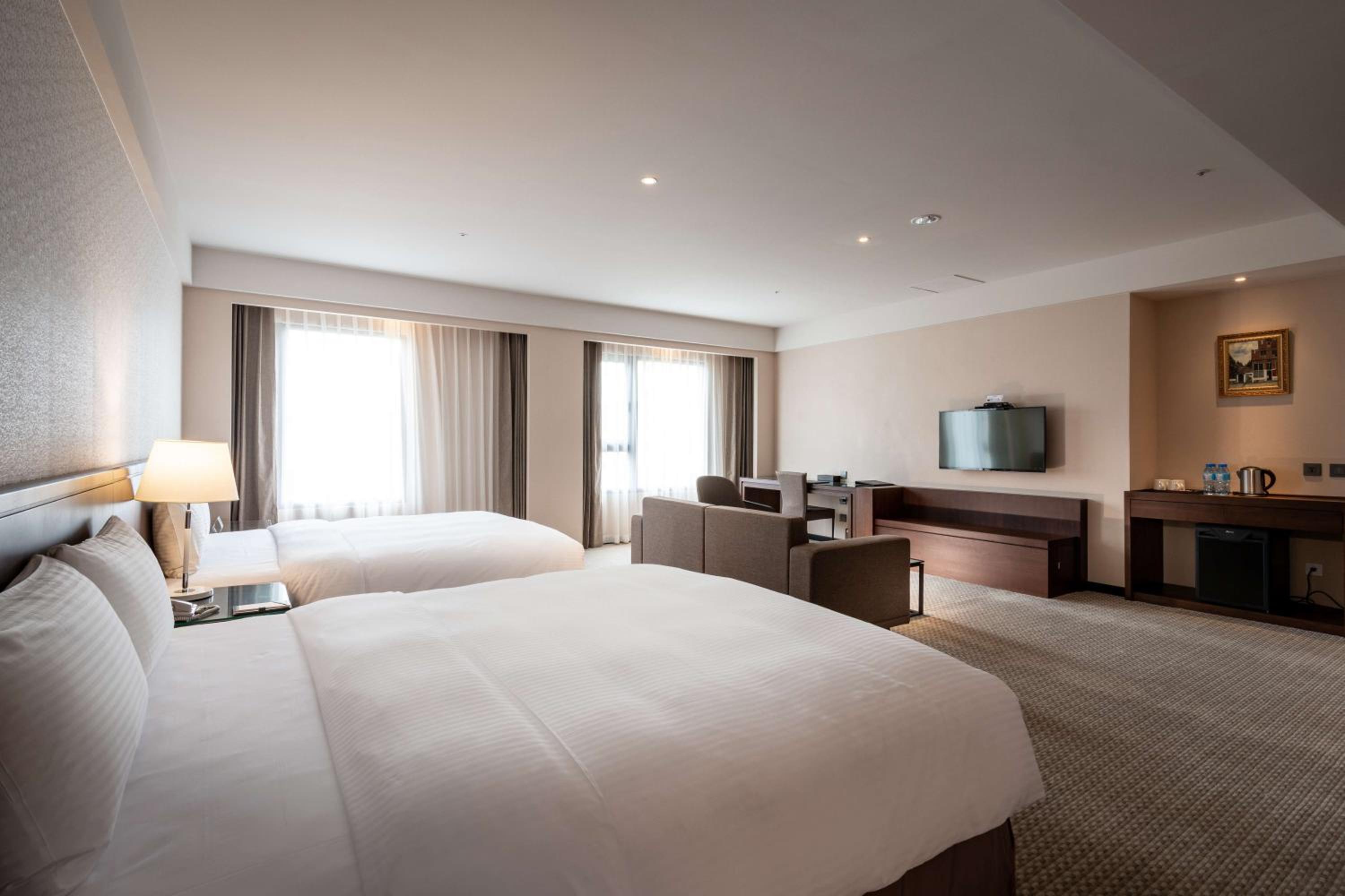 Deluxe Quadruple Room with Two Queen Beds