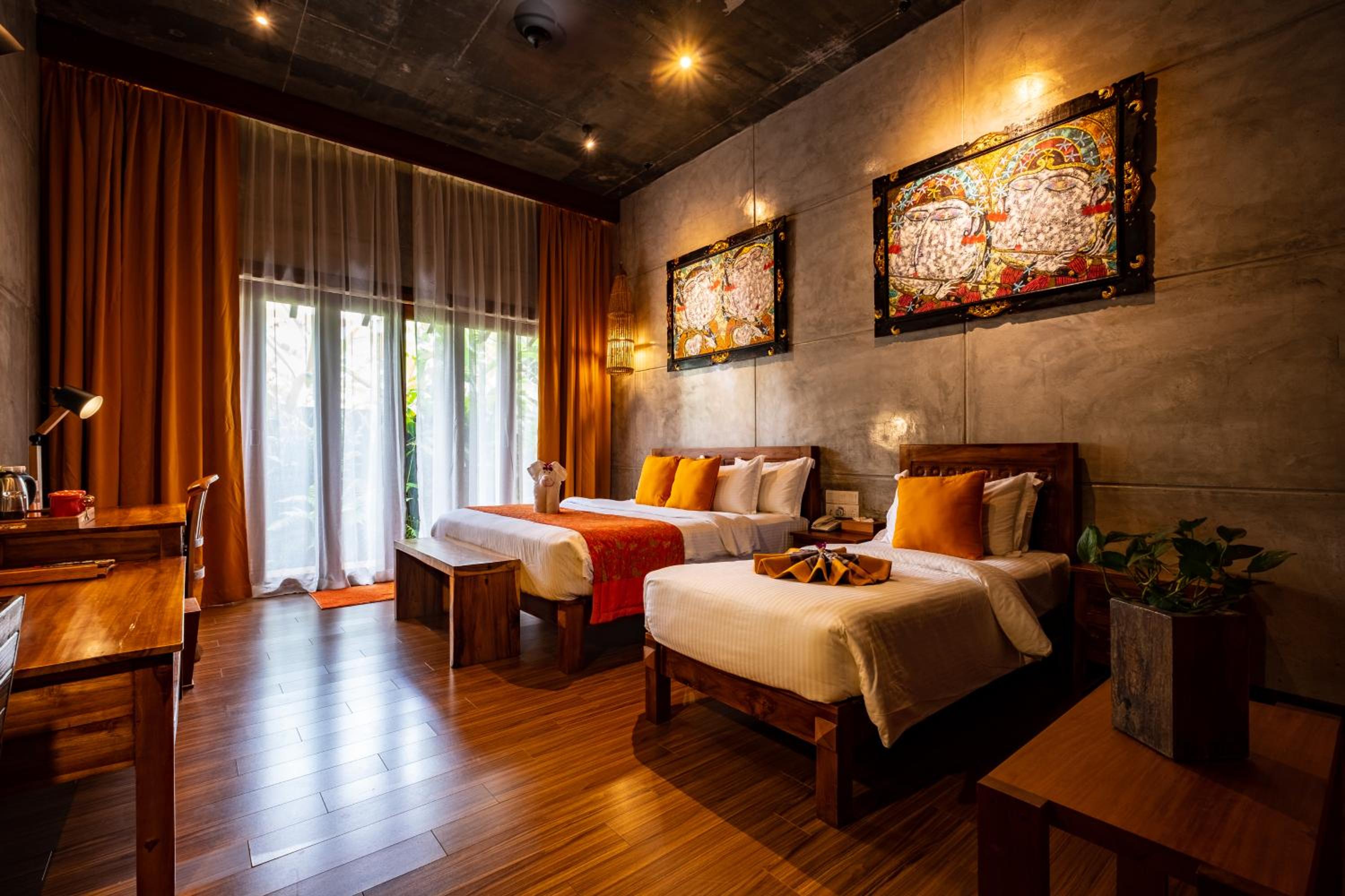 Deluxe Triple Room with Garden View and Bathtub photo 1