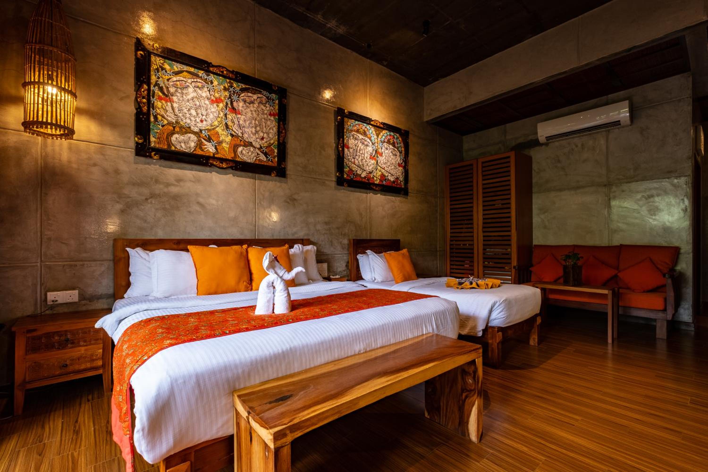 Deluxe Triple Room with Garden View and Bathtub photo 3