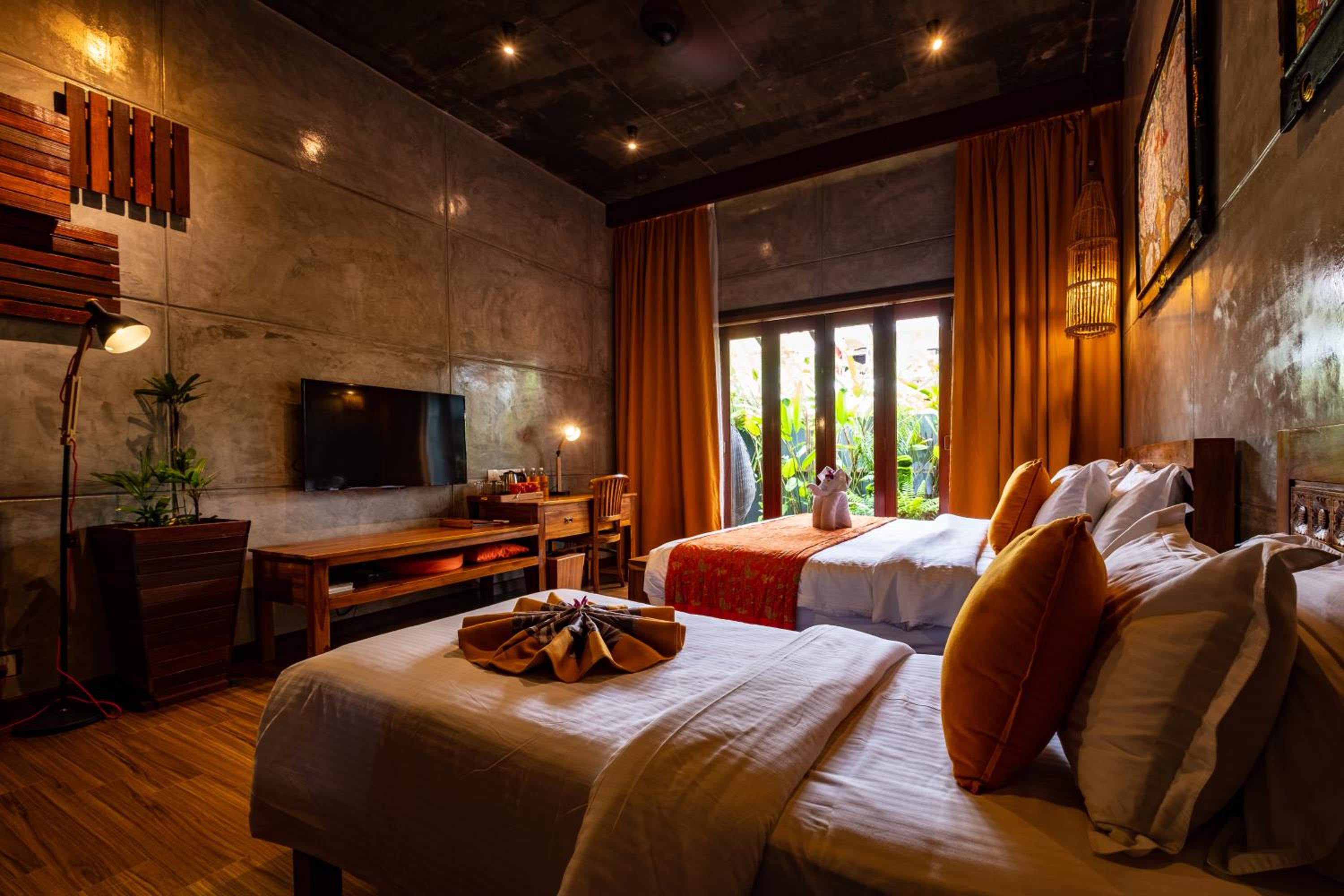 Deluxe Triple Room with Garden View and Bathtub photo 2