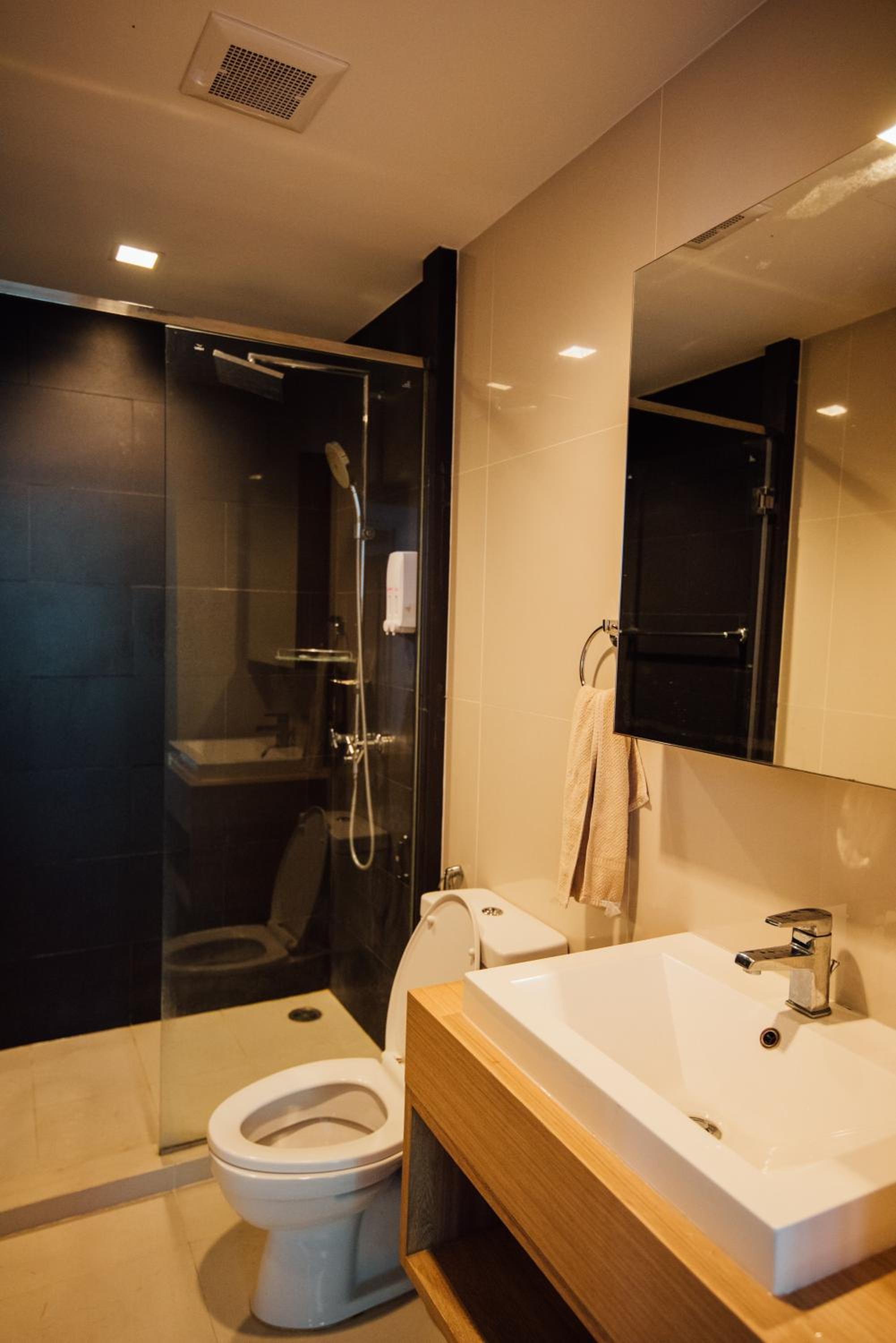 Three-Bedroom Apartment - Photo 2