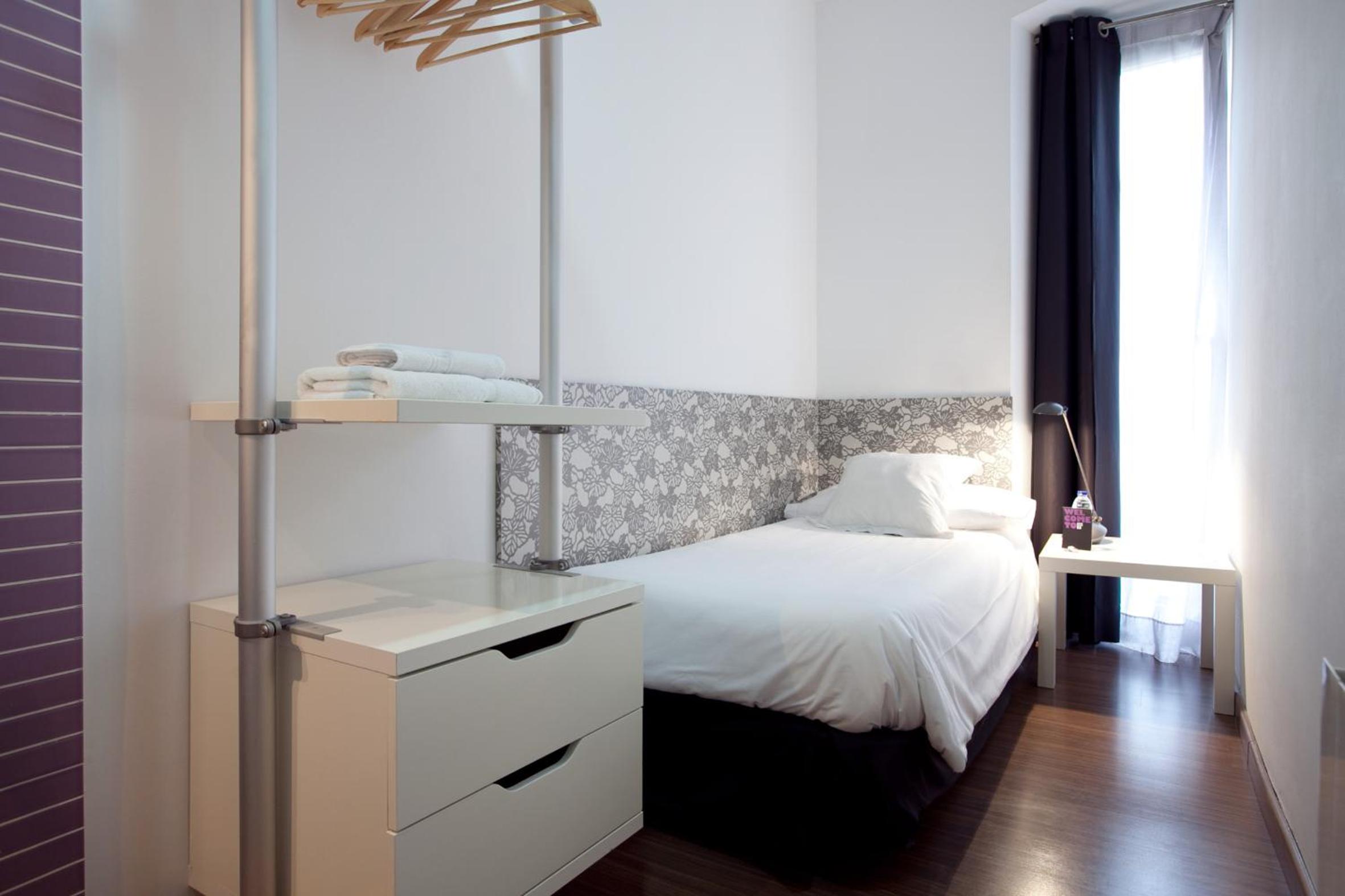 Habitación individual con baño compartido