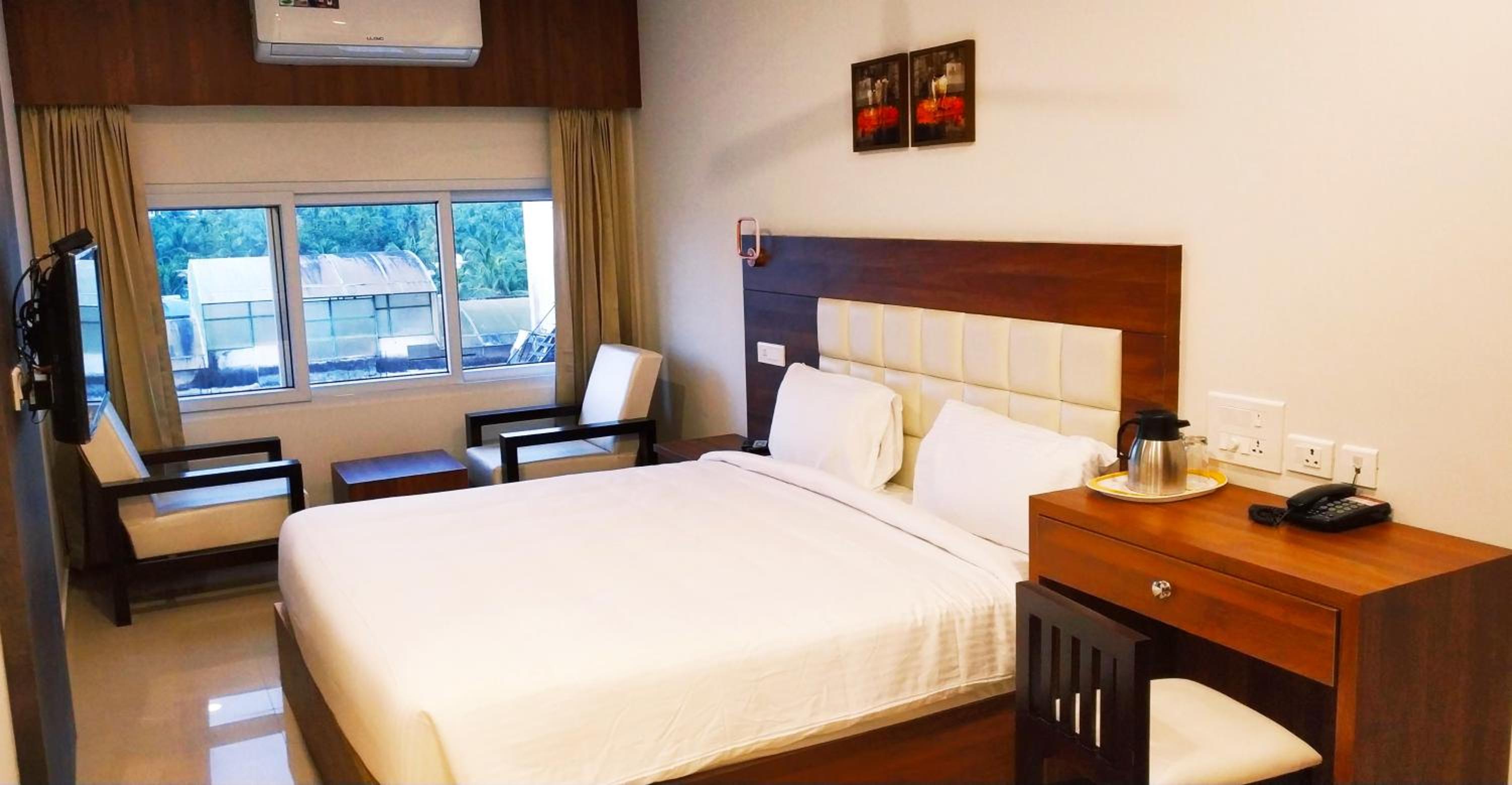 Deluxe Room - Photo 1