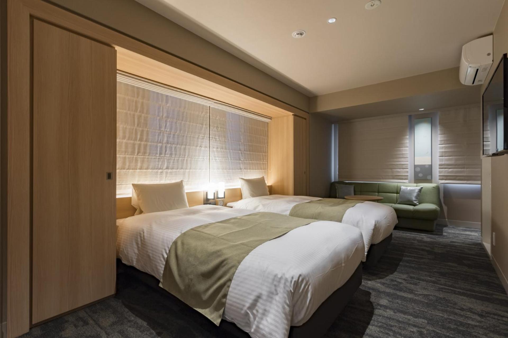 Deluxe Twin Room - Photo 13