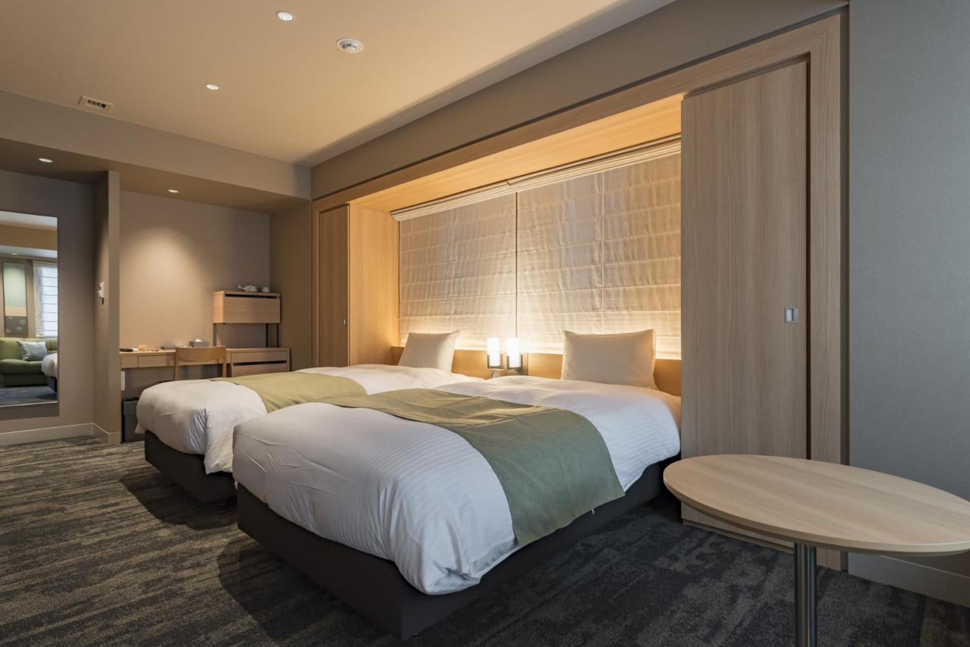 Deluxe Twin Room - Photo 11