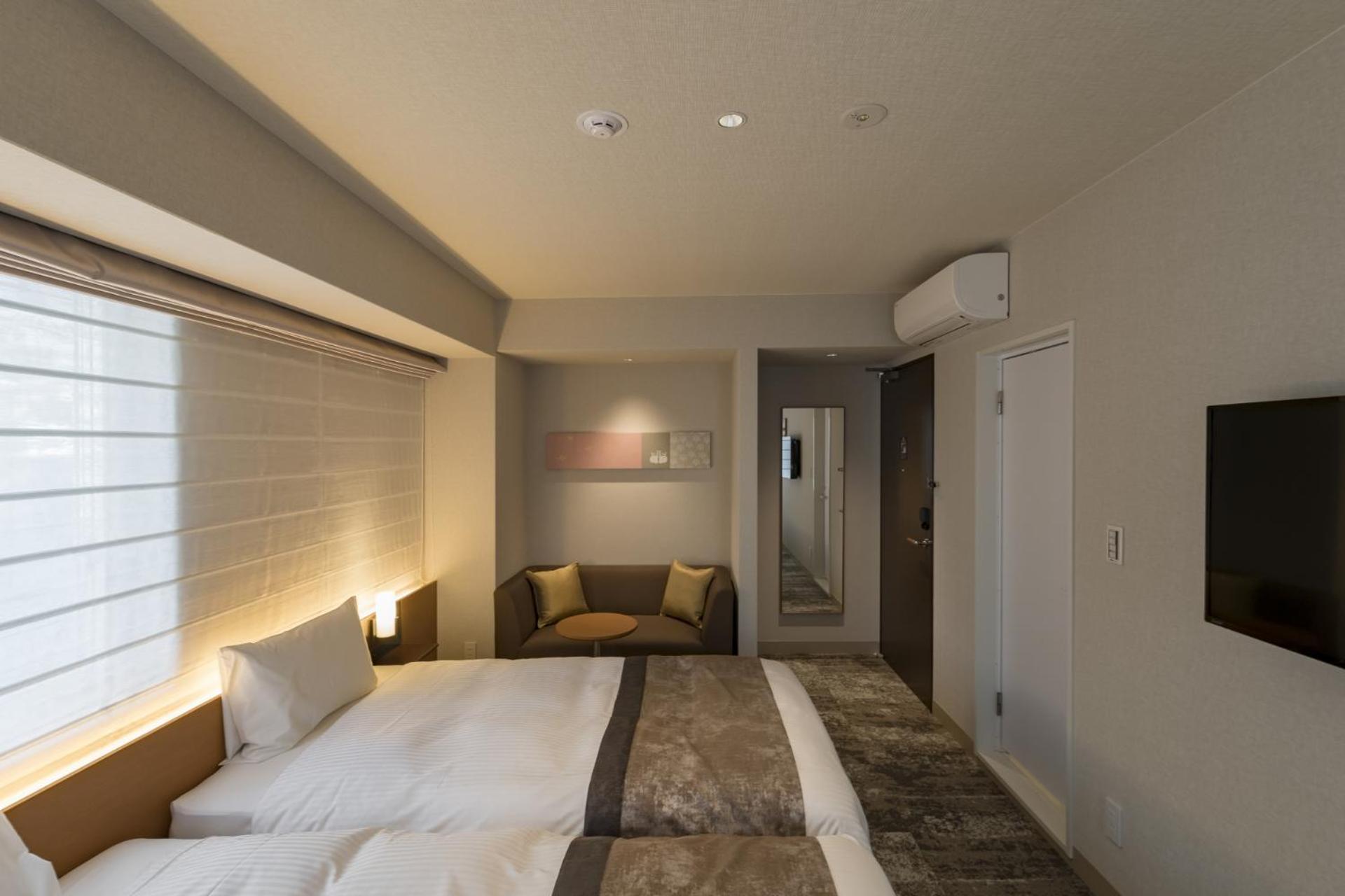 Standard Twin Room - Photo 15